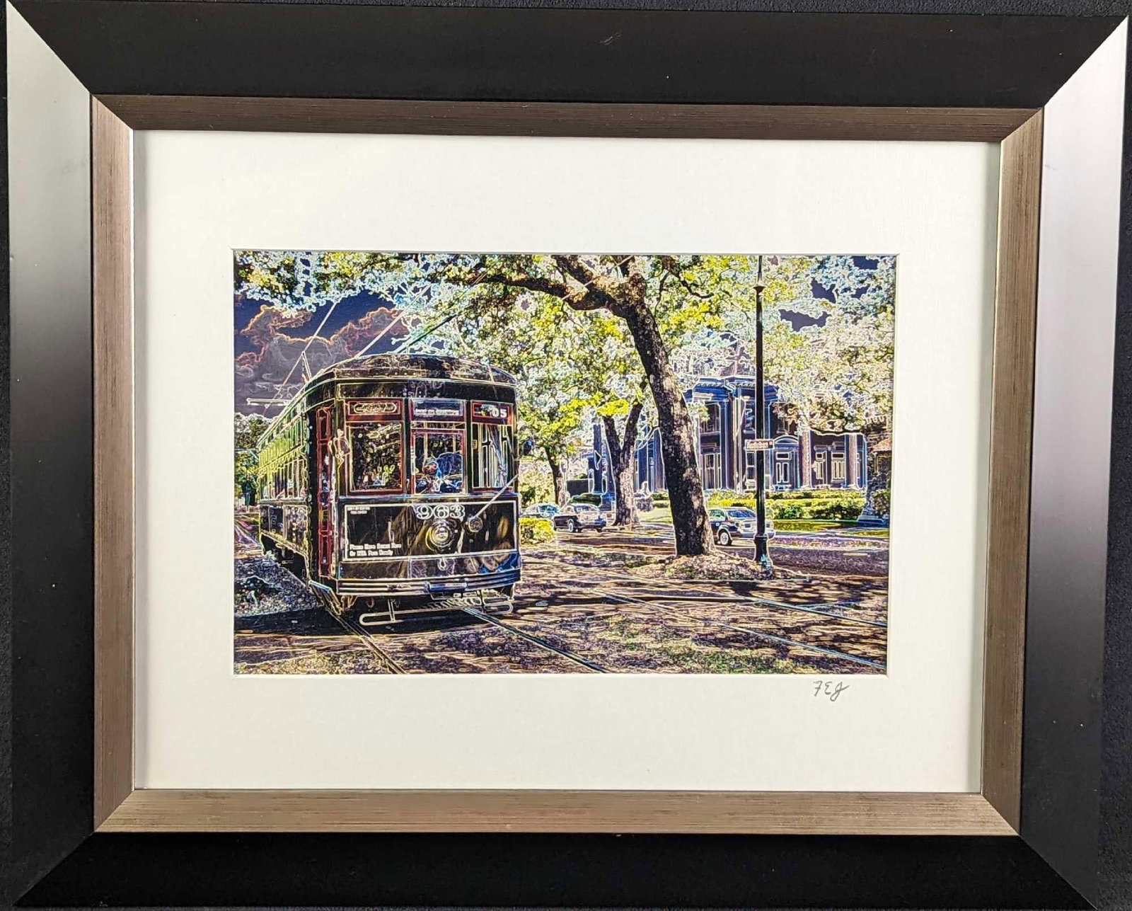 Framed Frank Juge Electric Streetcar Photo: Framed Frank Juge "Electric Streetcar" Photo. This altered digital photograph was signed by the artist on the bottom right of the matting. The framed photo is approx 17 1/4" x 1" x 14" and it weighs 1