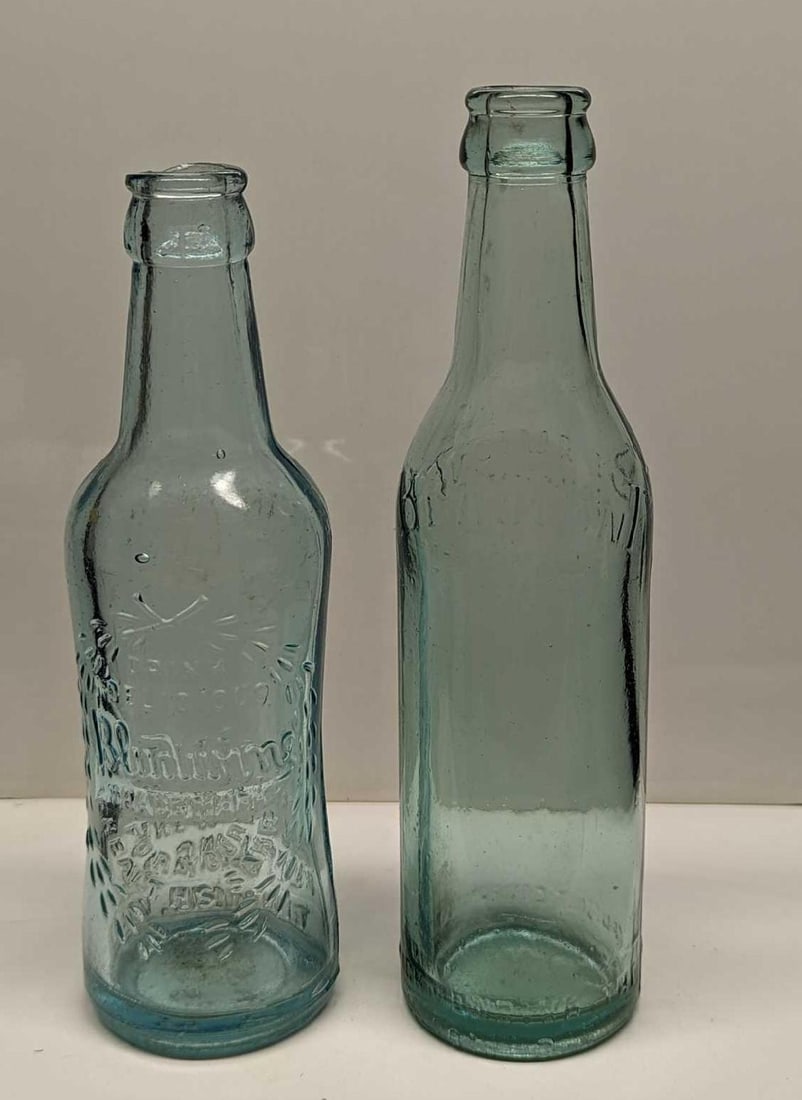 Vintage Bludwine & Beaufont Glass Bottles: Vintage Bludwine & Beaufont Glass Bottles. This lot includes: (1) "Drink Delicious Bludwine" Glass Bottle. "For Your Healths Sake". The bottle is approx 2 1/2" x 2 1/2" x 8