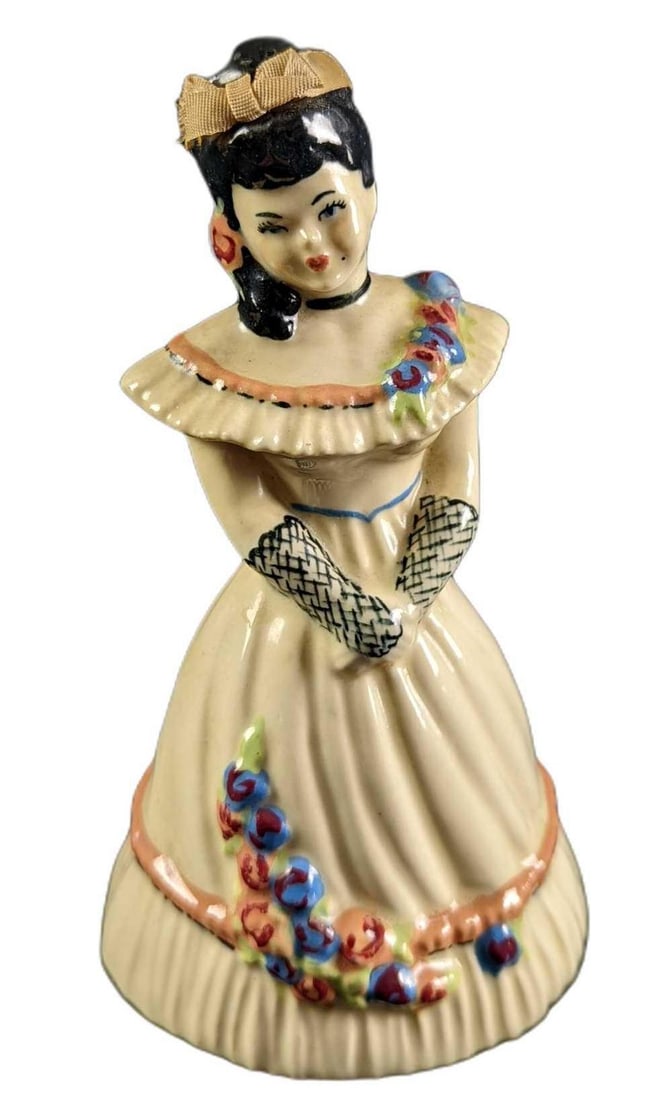Ceramic Art Studio Fiva Lady In Dress Bell: Ceramic Art Studio Diva Lady In Dress Bell. Is approx 3 1/2" x 3 1/4" x 6 1/2" and it weighs 0.58lb. Is in a good, vintage condition with some wear/markings on the bottom of the bell.