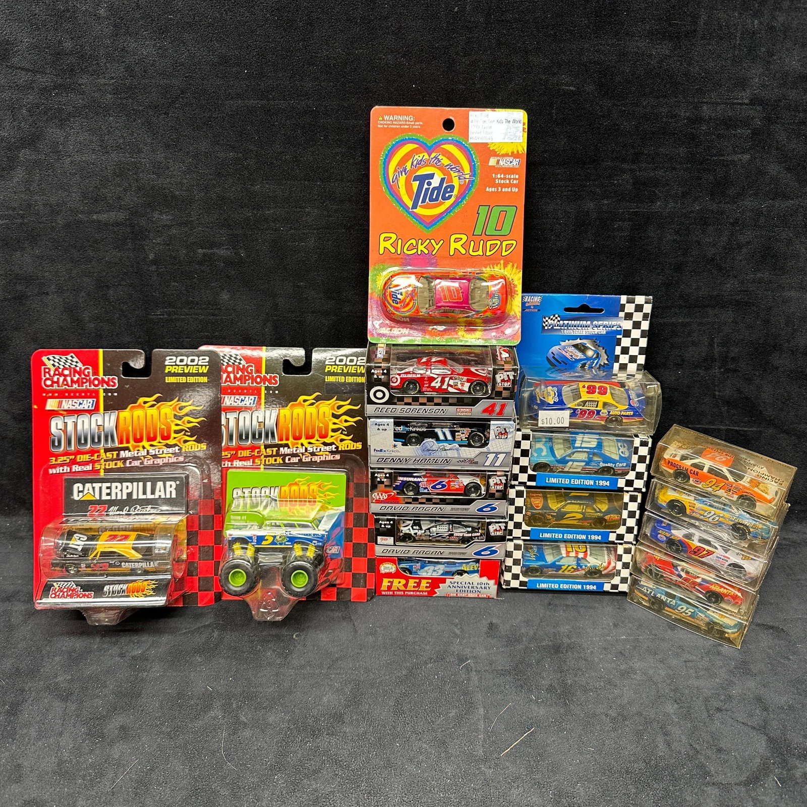 NASCAR Diecast Car Lot Racing Champions Action Pit Stop 1:64 Scale Assorted Tide Car: Mixed lot of NASCAR diecast cars, including Racing Champions, Action / Pit Stop, and other brands in 1:64 scale. Includes drivers such as Ricky Rudd Tide car, Reed Sorenson #41, Denny Hamlin #11, Davi