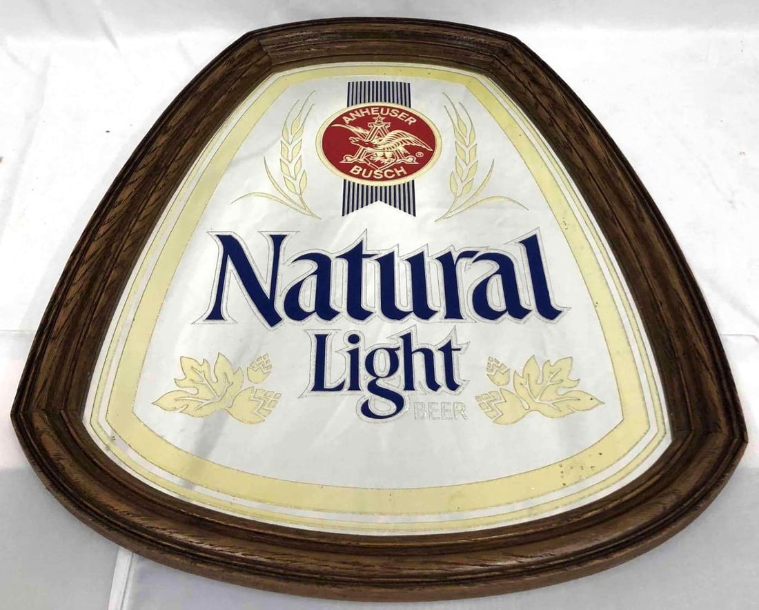 Anheuser Bush Natural Light Beer Mirror: This lot contains an Anheuser Bush Natural Light Beer mirror. This is the perfect decor for any at home bar or man cave. It is approx 21 1/4" x 17 1/2" and weighs about 2.9lbs. Overall the mirror is i