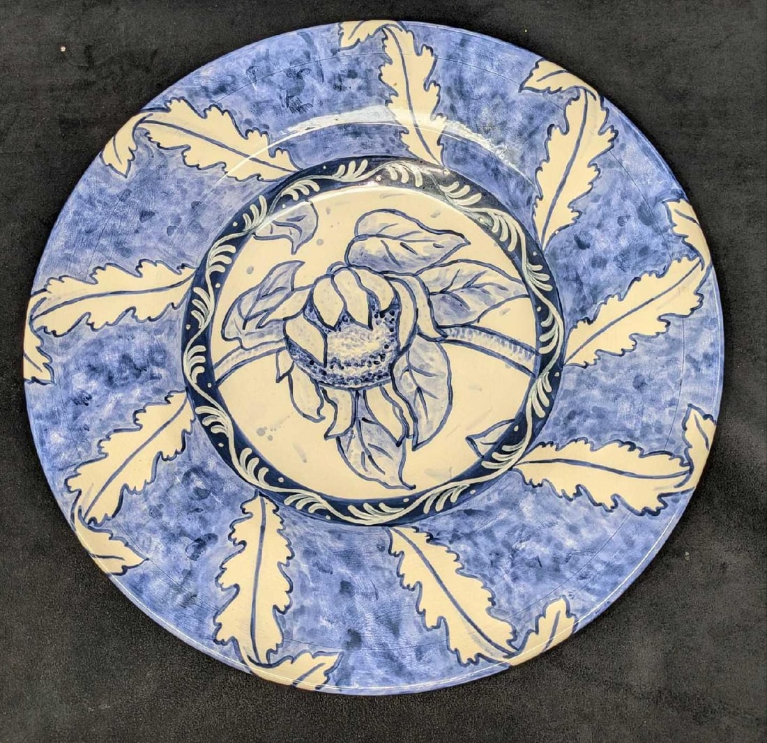 Moultrie Creek Studios Blue & White Ceramic Bowl: Moultrie Creek Studios Blue & White Ceramic Bowl. Made in St. Augustine, Florida. This is approx 16 1/4" x 16 1/4" x 2 5/8" and it weighs 6.10lbs. The hand painted bowl has some crazing. Please