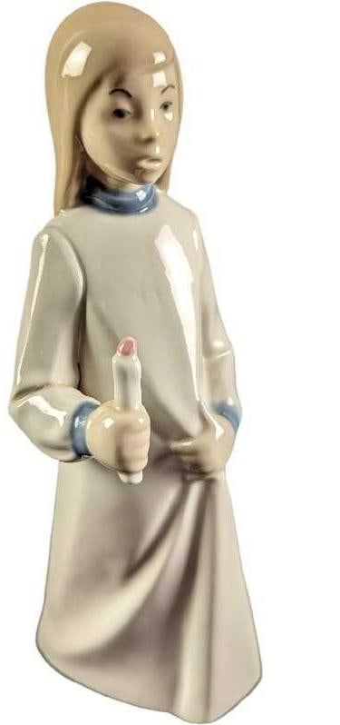 Vintage Rex Valencia Girl With Candle Figurine: Vintage Hummelwerk Rex Valencia Young Girl With Candle Porcelain Figurine. Made in Spain. Is approx 4" x 3" x 9 1/2" and it weighs 0.83lb. The figurine is in a good, vintage condition with no chips or