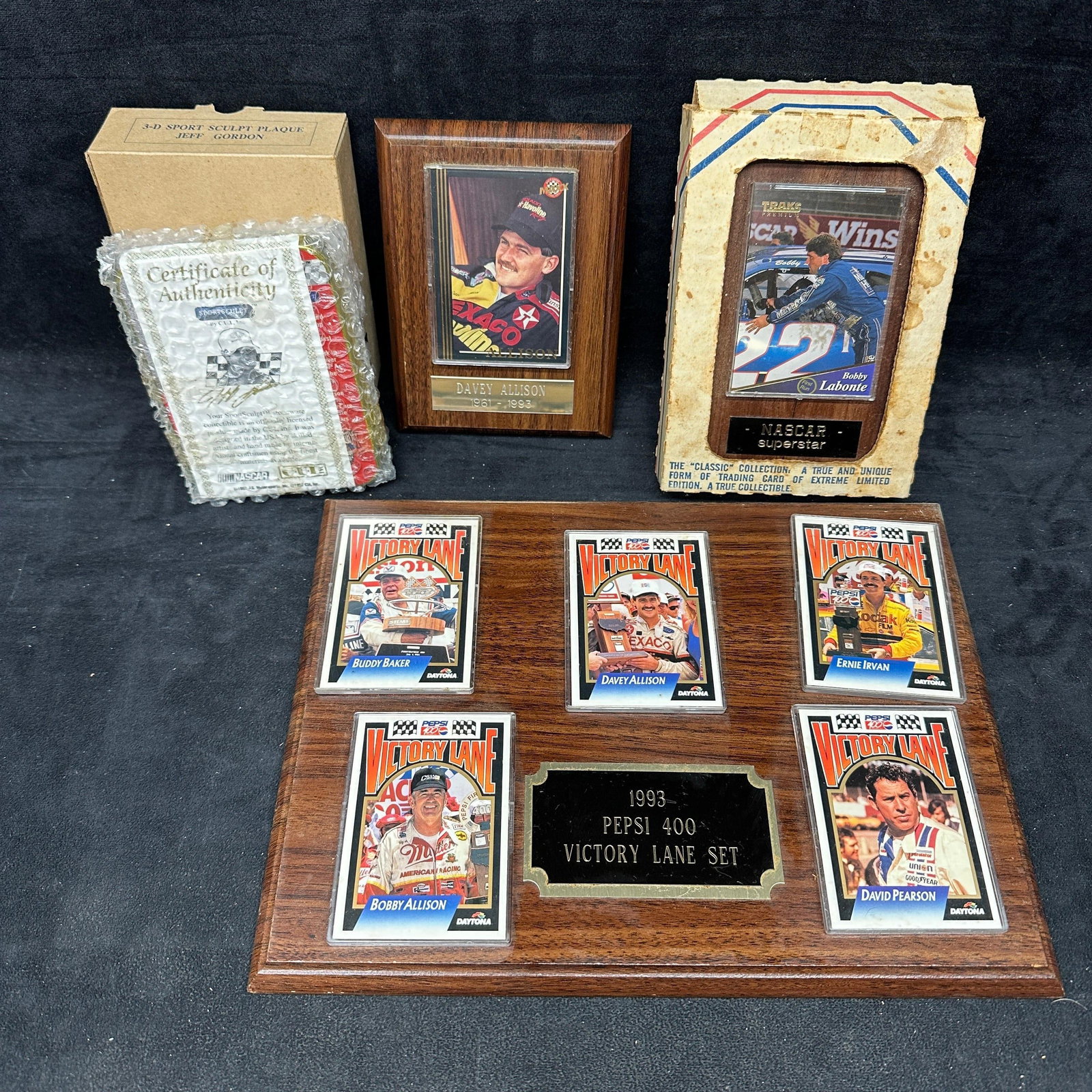 NASCAR Racing Memorabilia Plaques And Trading Card Display Collection Jeff Gordon: Group of NASCAR memorabilia and display collectibles, including a 1993 Pepsi 400 Victory Lane trading card display plaque. Also includes Davey Allison memorial plaque, Bobby Labonte NASCAR Superstar c