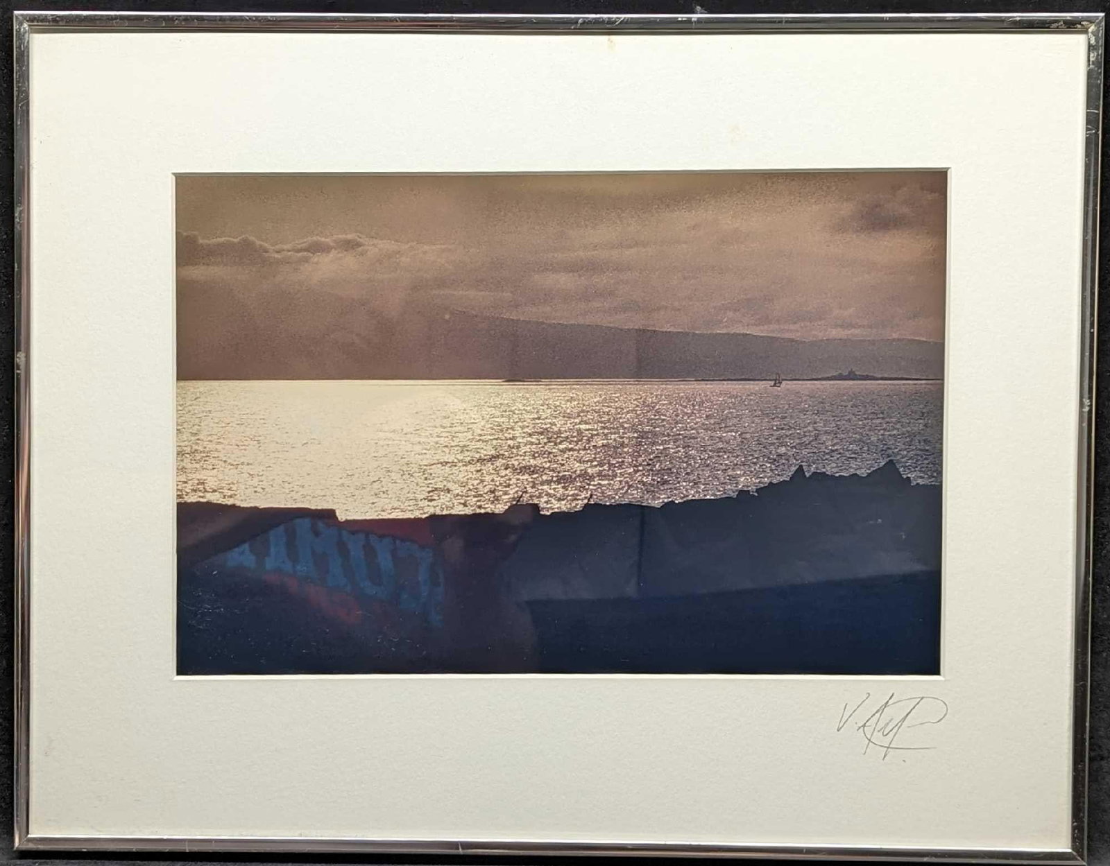 Framed Signed Coastal Photo Print: Framed Signed Coastal Photo Print. This framed photo print is approx 18" x 1" x 14 1/4" and it weighs 3.30 lbs. The framed photo print was signed on the matting by the artist. We could not make out th