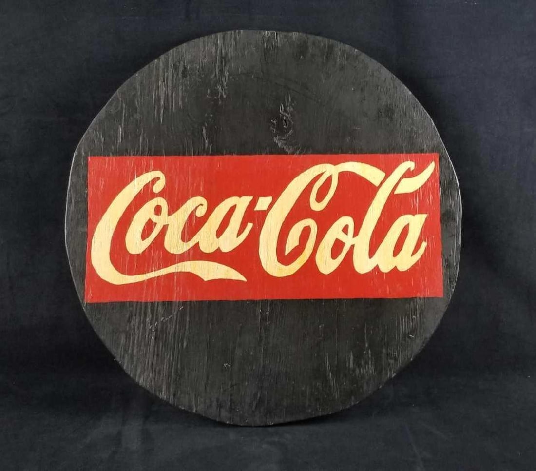 Round Handmade wooden Coca-Cola Sign: Round Handmade wooden Coca-Cola sign is black, red, and white. Made from plywood and hand painted. In good used condition with some surface scratches and yellowing of the letters. Approx. measures 32
