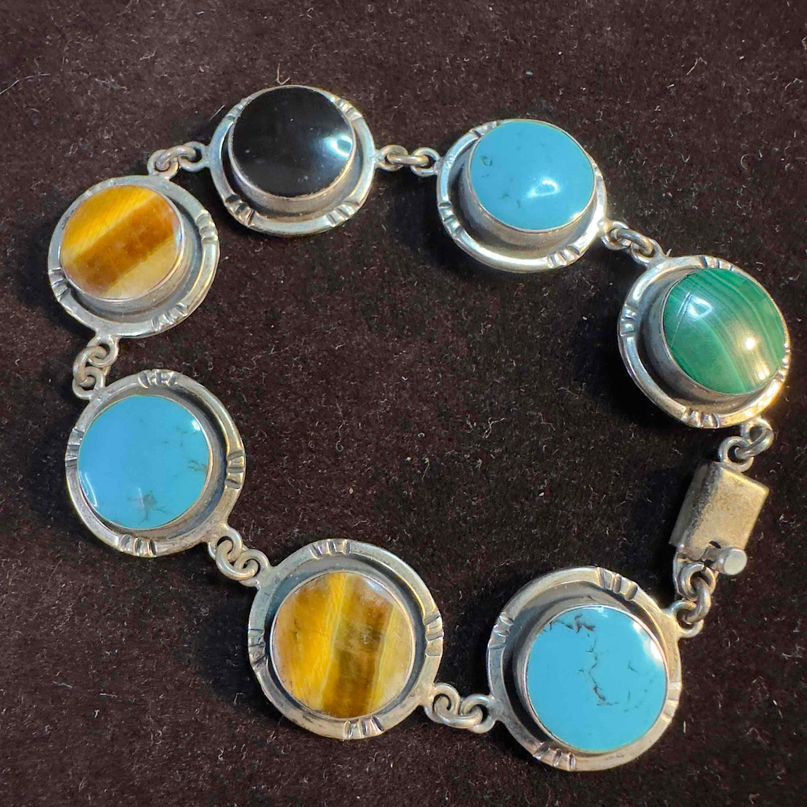 Multi Gemstone Sterling Silver Bracelet Onyx Turquoise Malachite Tiger's Eye: This item is in good pre-owned, previously used/displayed condition with noticeable light wear, and surface scratches. Please reference all photos for full details. This piece of jewelry has been test