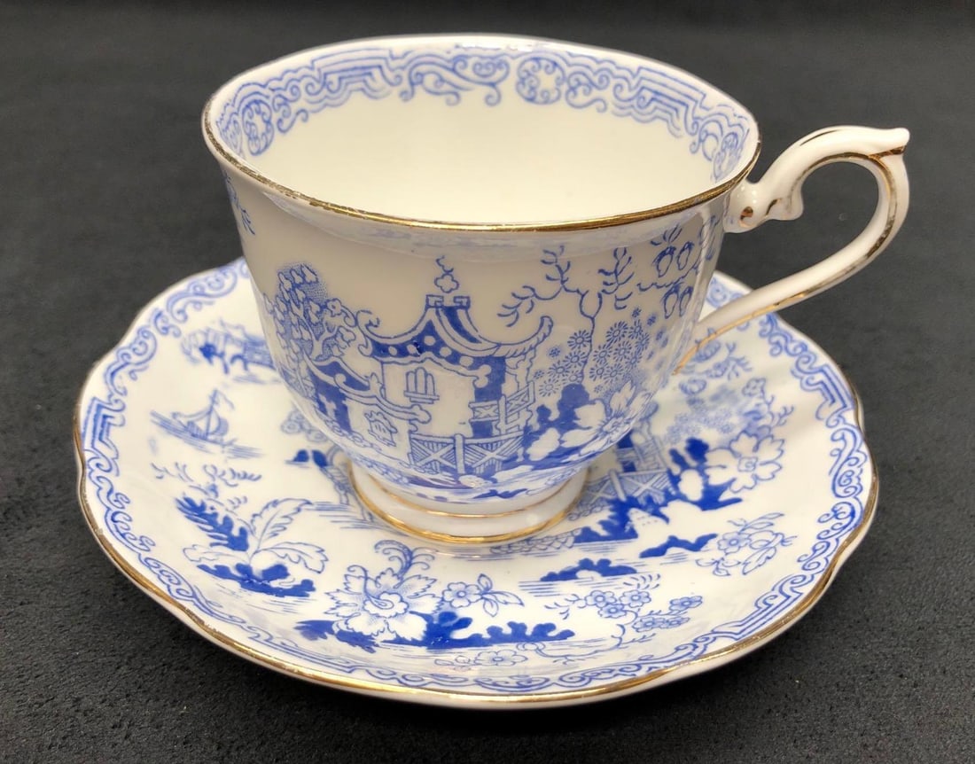 Royal Albert Fine Bone China Tea Cup & Saucer Set - Made in England - "Mikado" Pattern: Vintage Tea Cup and Saucer Set - Royal Albert Bone China - Made in England - "Mikado" Pattern. Tea Cup 4-1/4" x 3-1/4" x 2-3/4" Saucer 5-1/2" x 5-1/2" x 1" The combined
