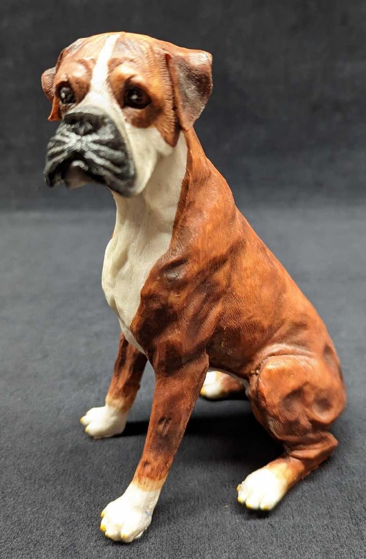 Hand Painted Resin Boxer Ears Down Figurine: Hand Painted Resin Boxer Ears Down Figurine. The maker and date of creation are unknown. This figurine is approx 5" x 3 1/2" x 6 3/4" and it weighs 0.30lb. The figurine has a small blue mark on the fr