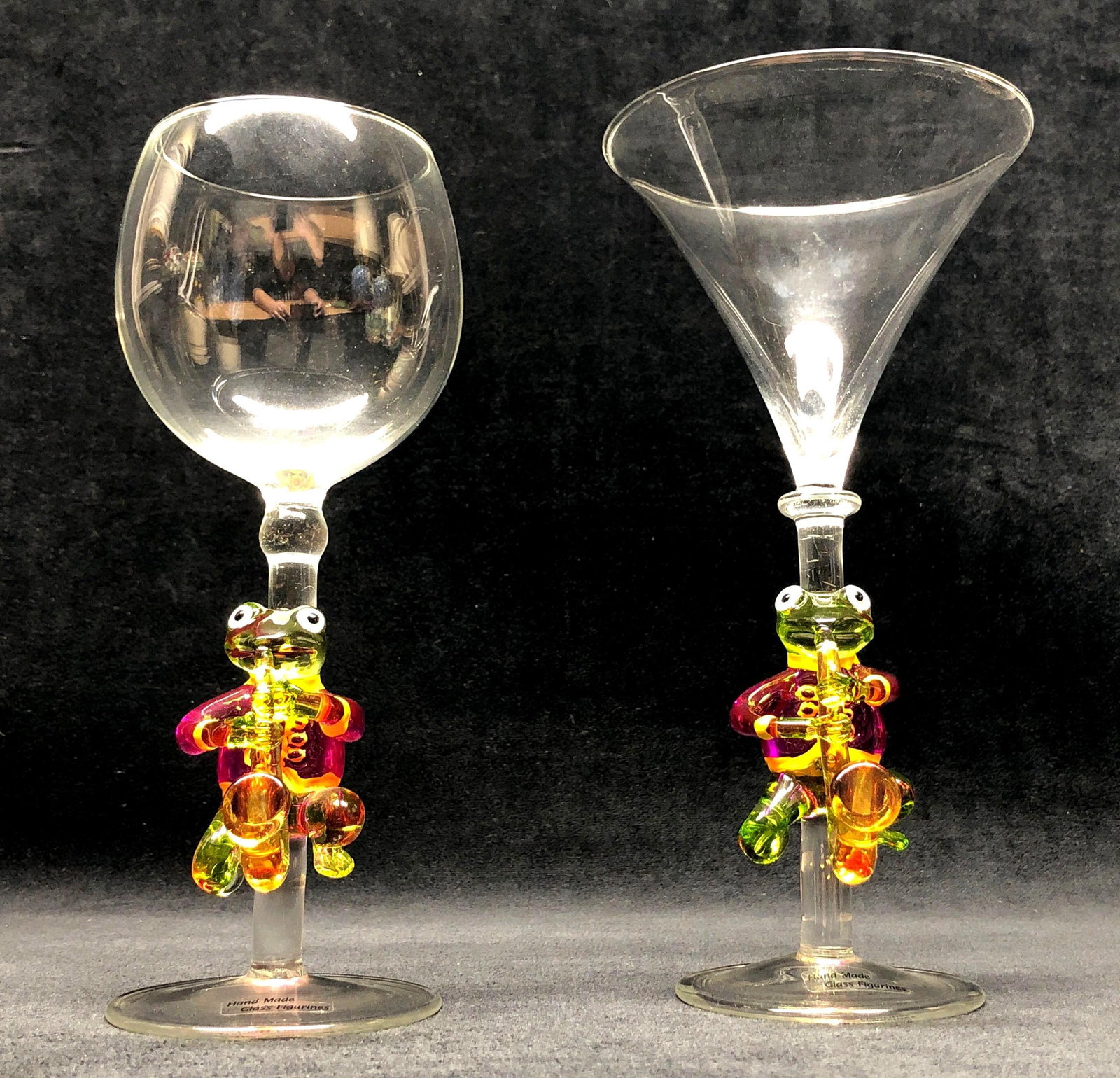 2pc Yurana Design "Green Frog Jazz Musician" 3D Stem Goblet Glasses: Yurana Design "Green Frog Jazz Musician" 3D Stem Goblet Glasses - Hand Hand Glass Figurines. (1) Goblet 9" x 4-1/4" x 4-1/4" (2) Goblet 8-1/2" x 3-1/2" x 3-1/2" T