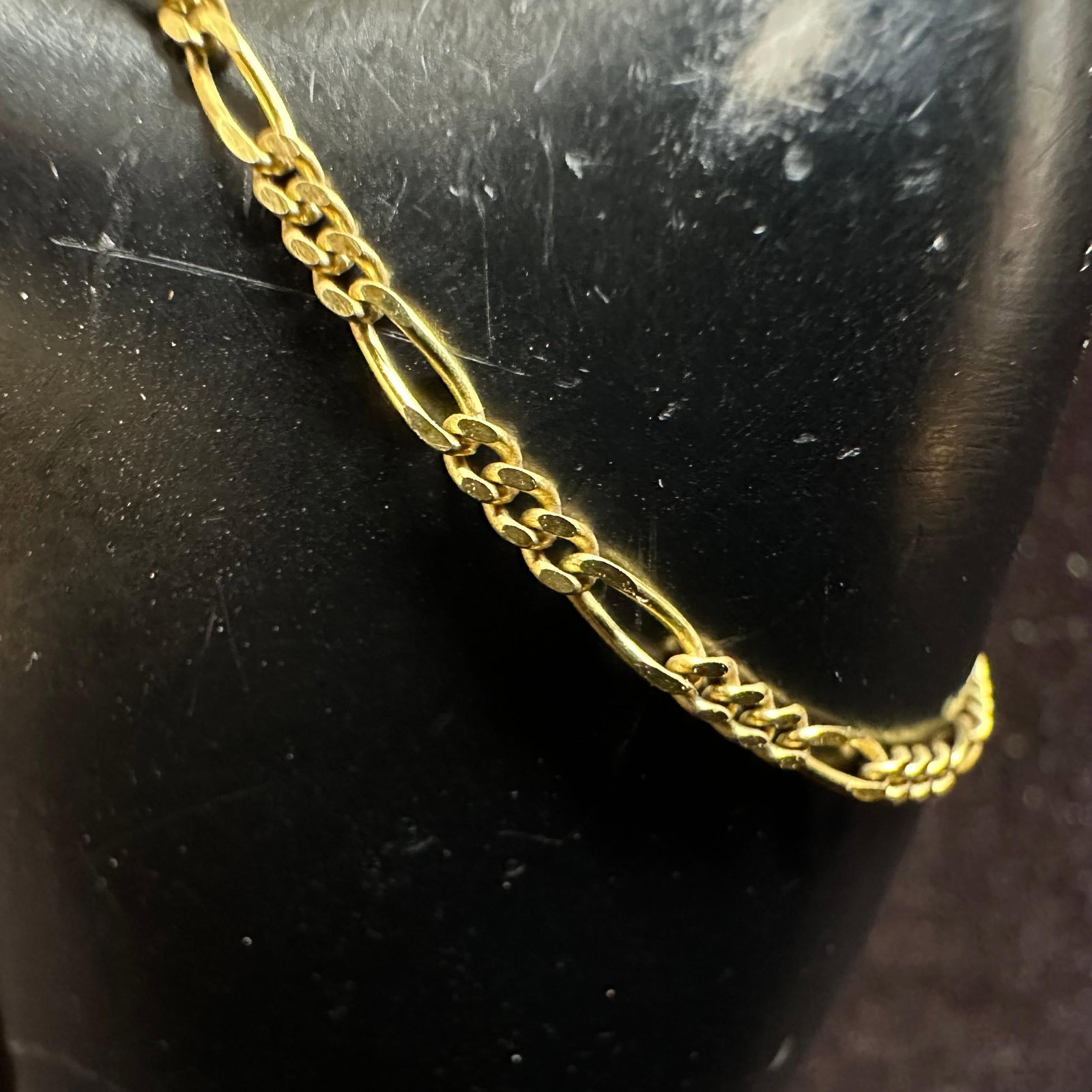 14K Yellow Gold RCI Figaro Chain Bracelet: This item is in good pre-owned, previously used/displayed condition with noticeable light wear and surface scratches. Please reference all photos for full details. This piece of jewelry has been teste