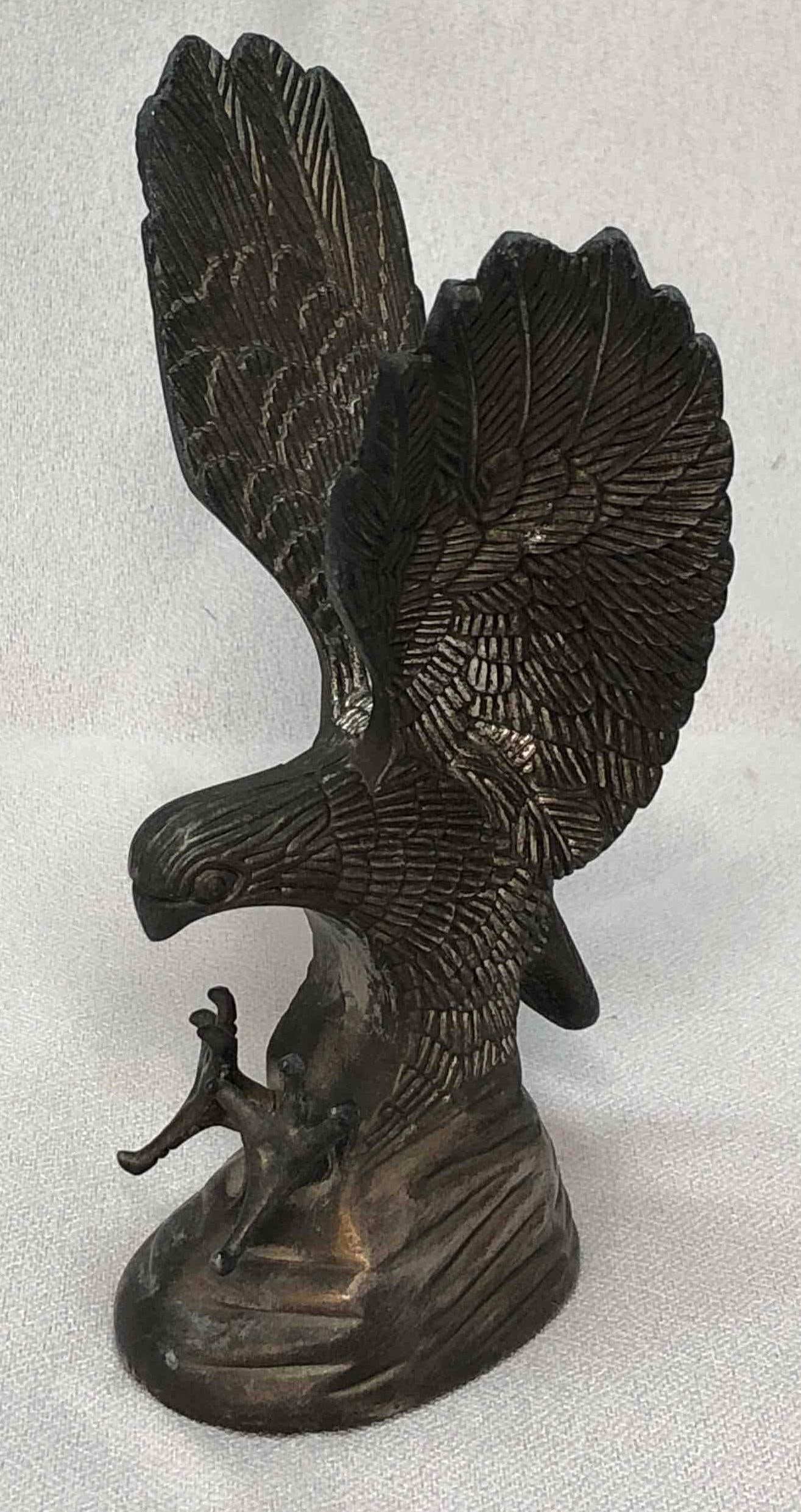 Hampshire Genuine Silverplated Eagle Sculpture: Hampshire Genuine Silverplated Eagle Sculpture. Item is approximately 5" x 3" x 2-1/2" and weighs 0.6lbs. Overall the Silverplated Eagle is in good used condition with signs of light wear and use. Ple