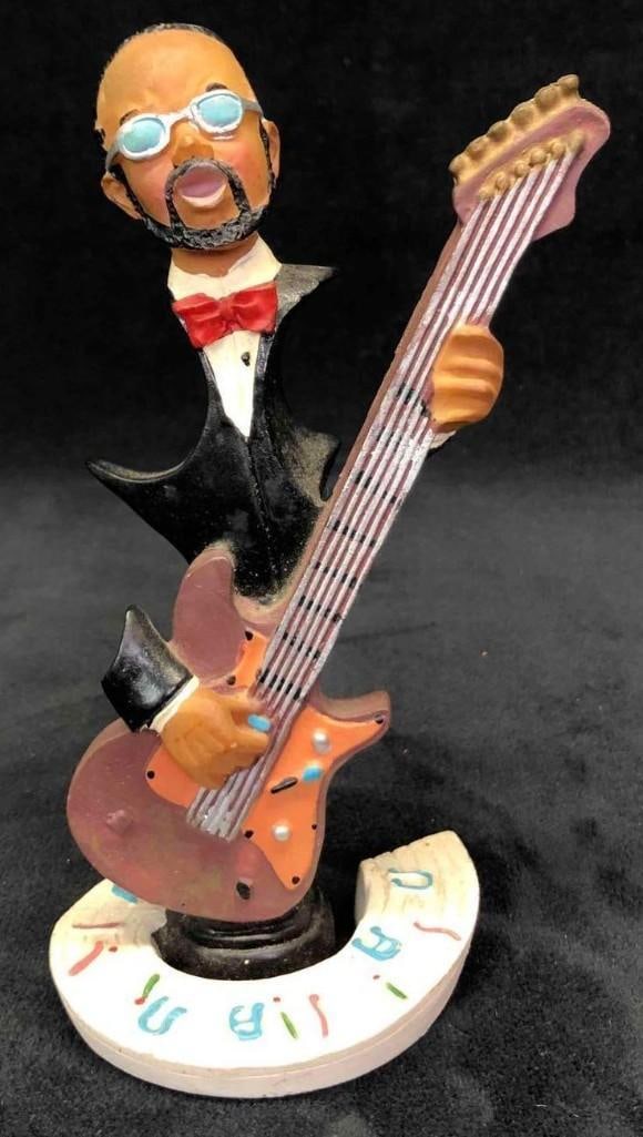 Guitar Player Figurine Musician Statue African American Jazz Art Deco: Guitar Player Figurine Musician Statue African American Jazz Art Deco. This lot contains a guitar player figurine musician statue African American jazz art deco. This figurine is the perfect gift