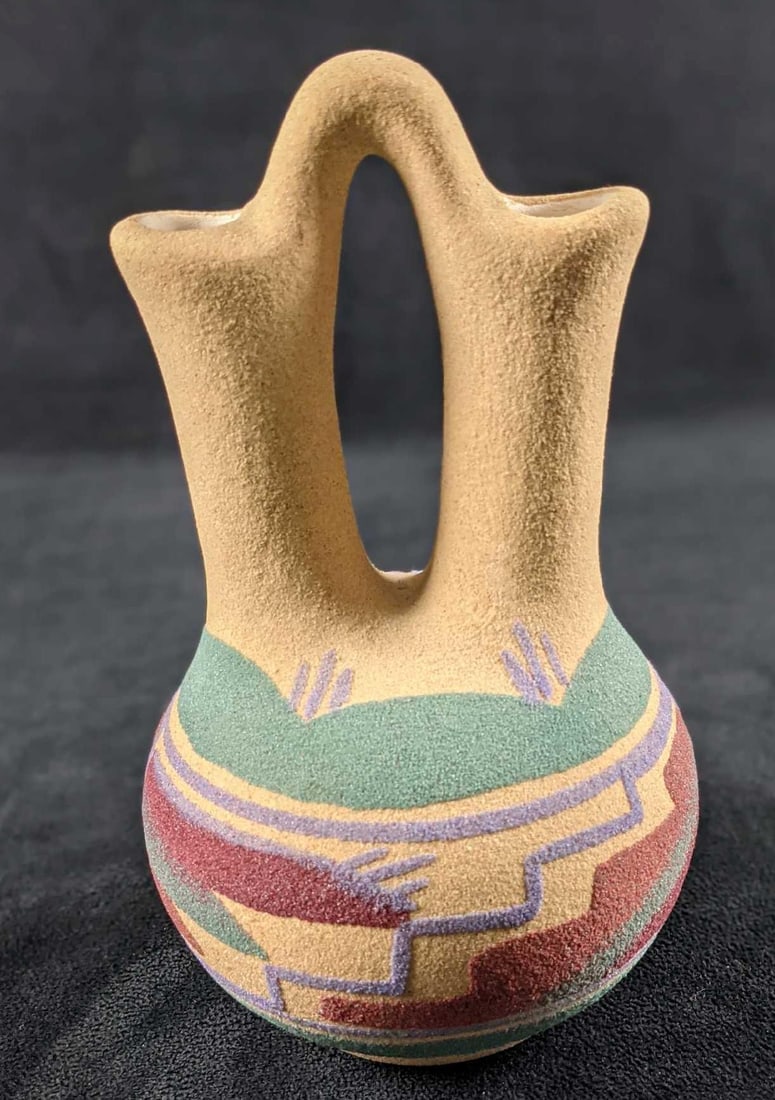 Hand Painted Navajo Native American Sand Wedding Vase: Authentic Original piece of sand art, Hand-painted using natural colored sands by Navajo Native Americans. The Wedding Vase is approx 5" x 5" x 7 1/2". Is in good, used condition with light wear. Was