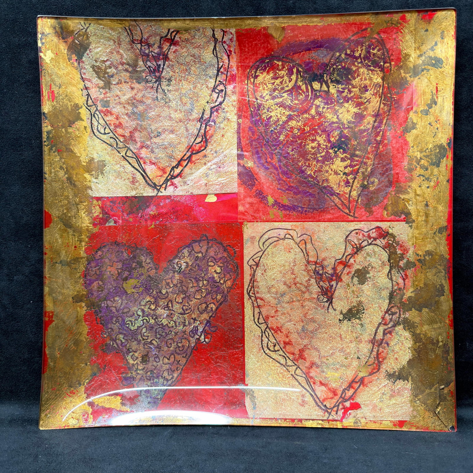 Laurel A Wilder Platter Hand-Crafted Art Glass Plate Signed Laurels Heart: Decorative handcrafted art glass tray/platter plate titled Laurel's Heart, featuring four abstract heart motifs in rich red, purple, and gold tones with metallic accents. The reverse is signed and