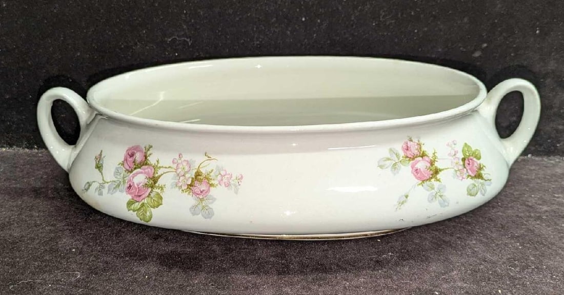 Vintage Verona China Serving Bowl With Handles: Vintage Verona China Serving Bowl With Handles. This is approx 11 1/2" x 7 1/4" x 3" and it weighs 1.35lb. There is some markings/crazing on the end on the inside and outside. Please see the images as
