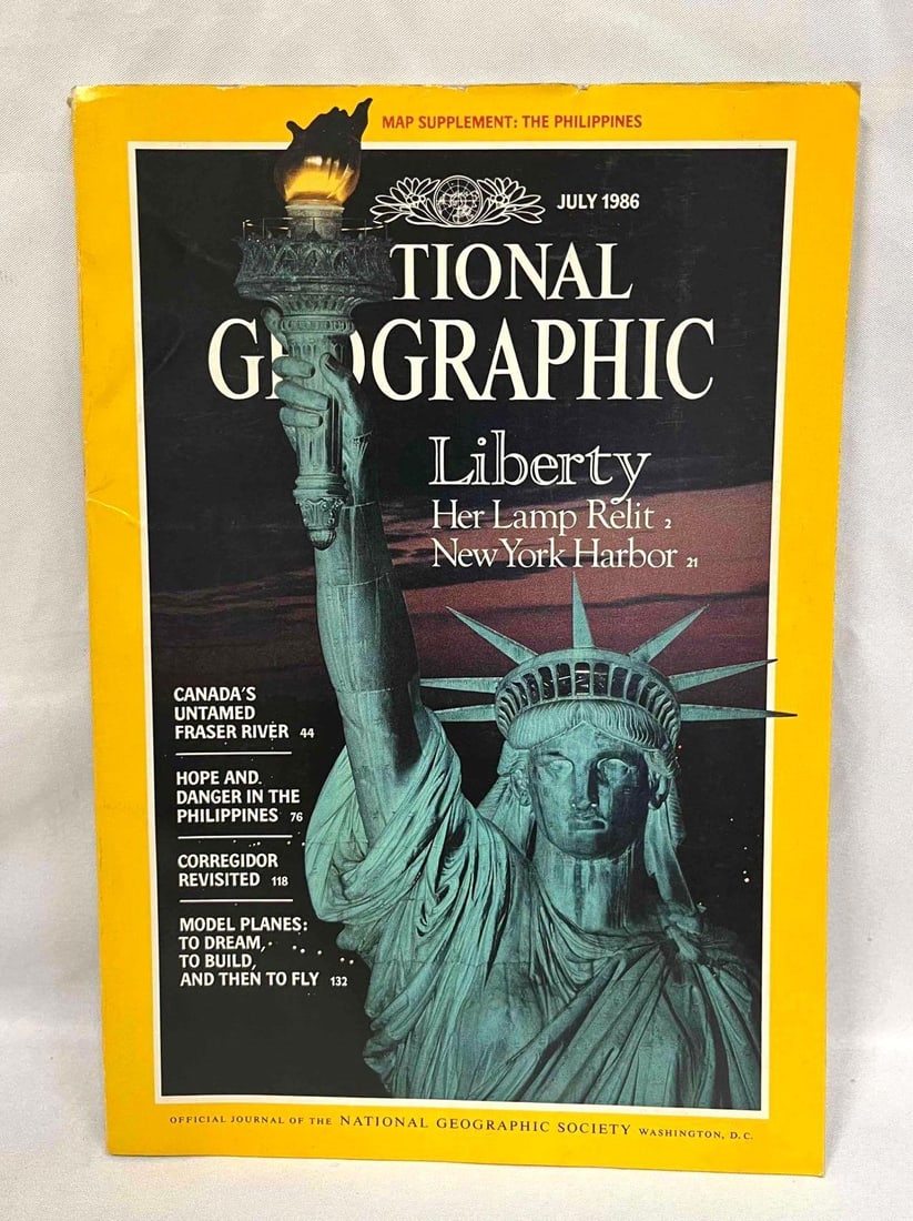 National Geographic July 1986 Liberty Her Lamp Relit: This lot contains a National Geographic July 1986 Liberty Her Lamp Relit. The magazine is approx 7" x 1/4" x 10" and the total weight is 0.8lbs. The cover has some light shelf wear. Please refere