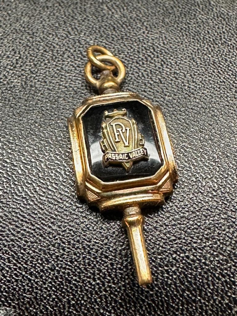 10k Gold Passaic Valley HS (NJ) 1952 Class Pendant: This piece of jewelry has been tested and researched prior to listing. Please view all our pictures they are part of our description. DETAILS: Metal - 10k Gold Color - Yellow/Gold Stones - Onyx Hallma