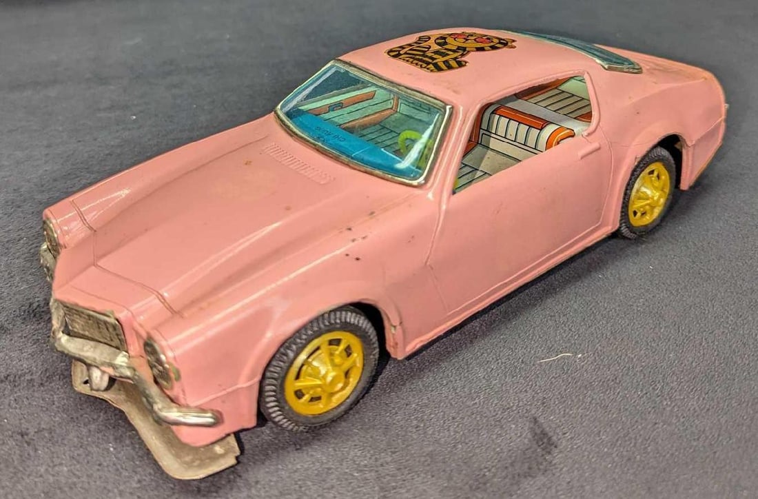 Vintage 1970s Chi Hung Chevy Camaro Tin Friction Toy Car - Pink: Vintage 1970s Chi Hung Chevy Camaro Tin Friction Toy Car - RARE Pink Color. Condition is used with some minor damage to the bumper- missing decals - broken friction - as pictured. This is approx 4