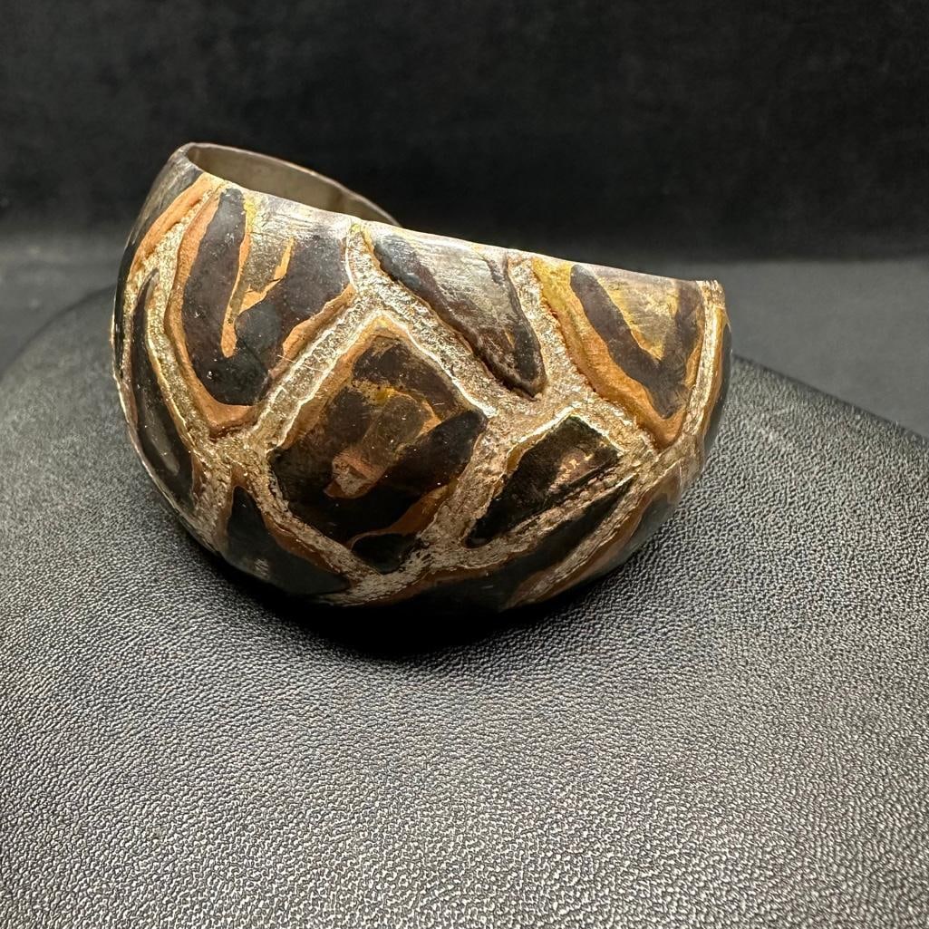 Sterling Silver Esperanza Adj. Bangle: This piece of jewelry has been tested and researched prior to listing. Please view all our pictures they are part of our description. DETAILS: Metal - Sterling Silver Color - Silver Stones - none