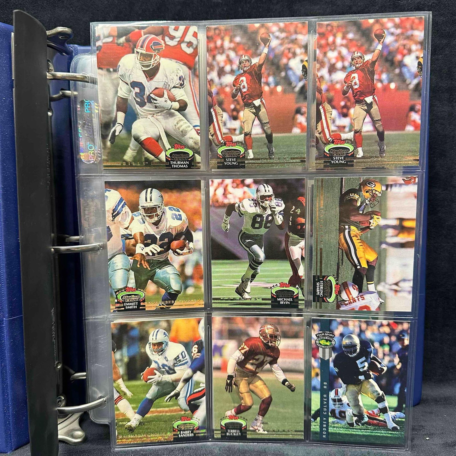 Mixed Lot Collection of Football Cards 1990's Topps Stadium Club Pro Set Florida State Seminoles: Binder of mixed football cards from the late 1980's and early 1990's. Brands include Topps, Stadium Club, and Pro Set. Features stars and Hall of Famers such as Steve Young, Emmitt Smith, Thur