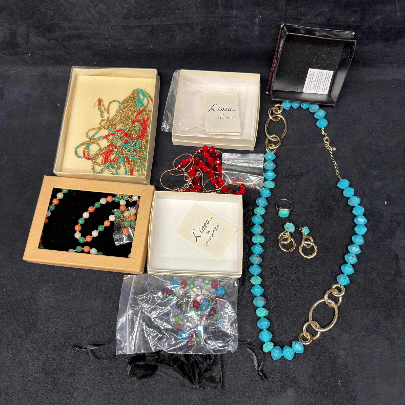 Mixed Fashion Jewelry Lot Including Glass Bead and Turquoise Style Necklace Set: Large assorted costume jewelry lot featuring multiple Linea by Louis Dell'Olio pieces, including original presentation boxes. Includes a turquoise-look beaded necklace with matching earrings and r