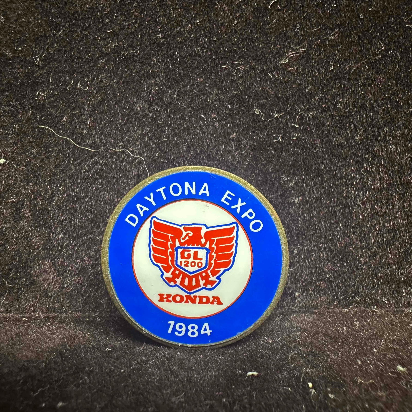 Daytona Expo Honda 1984 Lapel Pin: Vintage Honda lapel pin from 1984. This item is in good pre-owned, previously displayed condition with light wear, and surface scratches. Please reference all photos for full details. Pin: 1". Wei