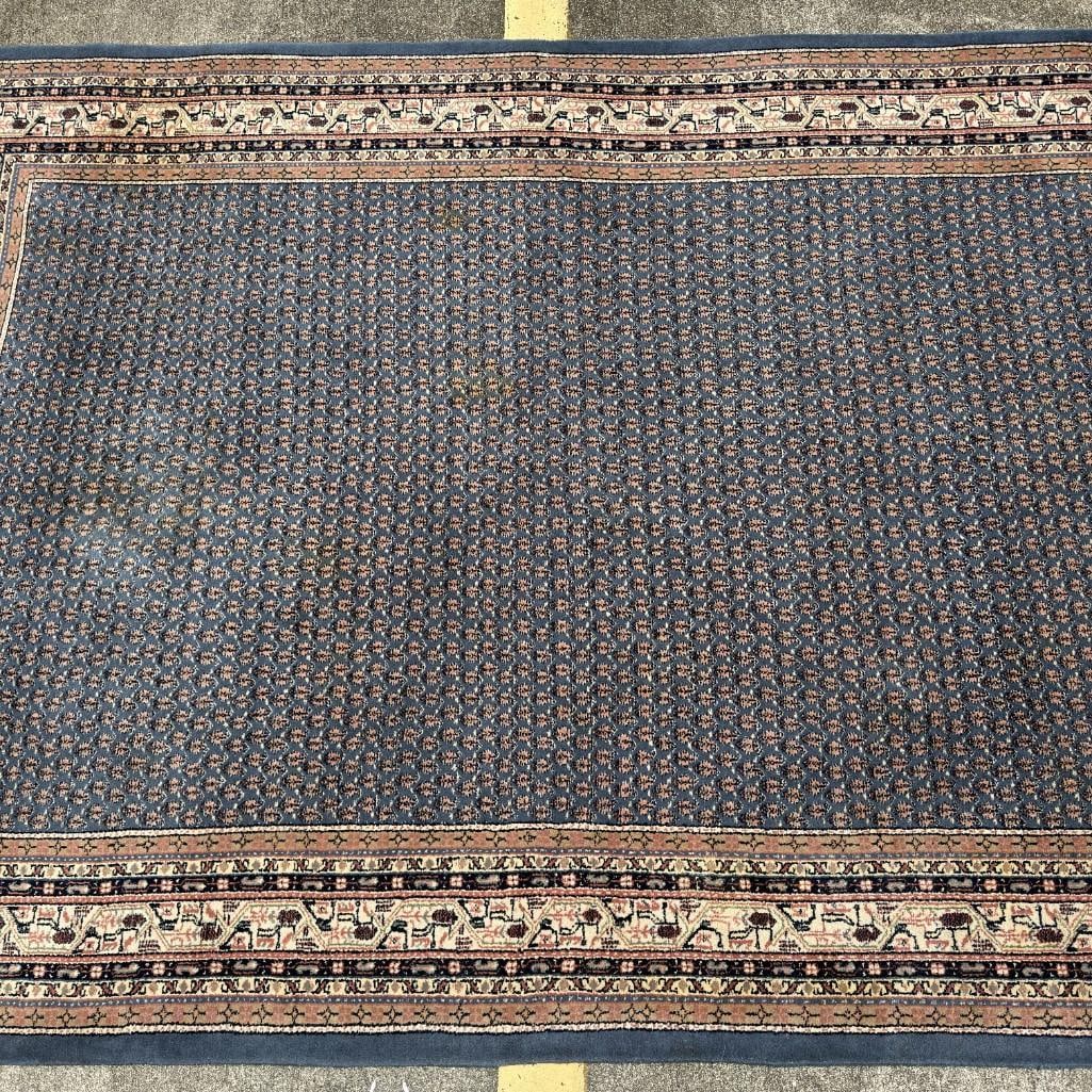 Kaimuri Hand Made in India Virgin Wool Area Rug: Handmade Kaimuri area rug, crafted in India from 100% virgin wool pile. Features a traditional all-over geometric field with an ivory, burgundy, and blue decorative border and fringe on both ends. Lab