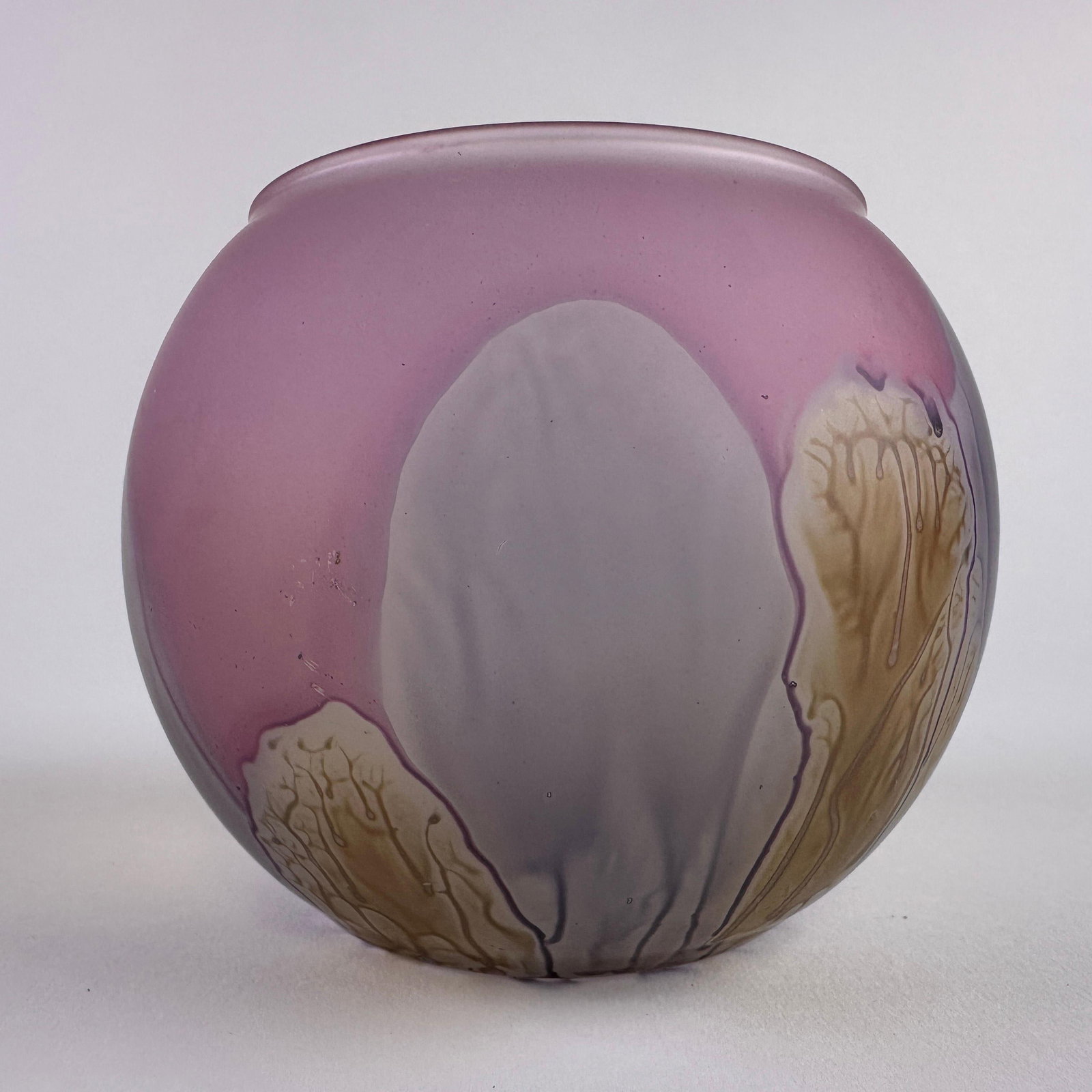 Rueven Bud Vase Frosted Purple Pink Vintage Nouveau Art Glass Hand Painted: Decorative Rueven art glass bud vase with rounded globe form and satin finish. Features flowing Art Nouveau-inspired organic decoration in pink, lavender, gray, cream, and amber tones with drip and fe