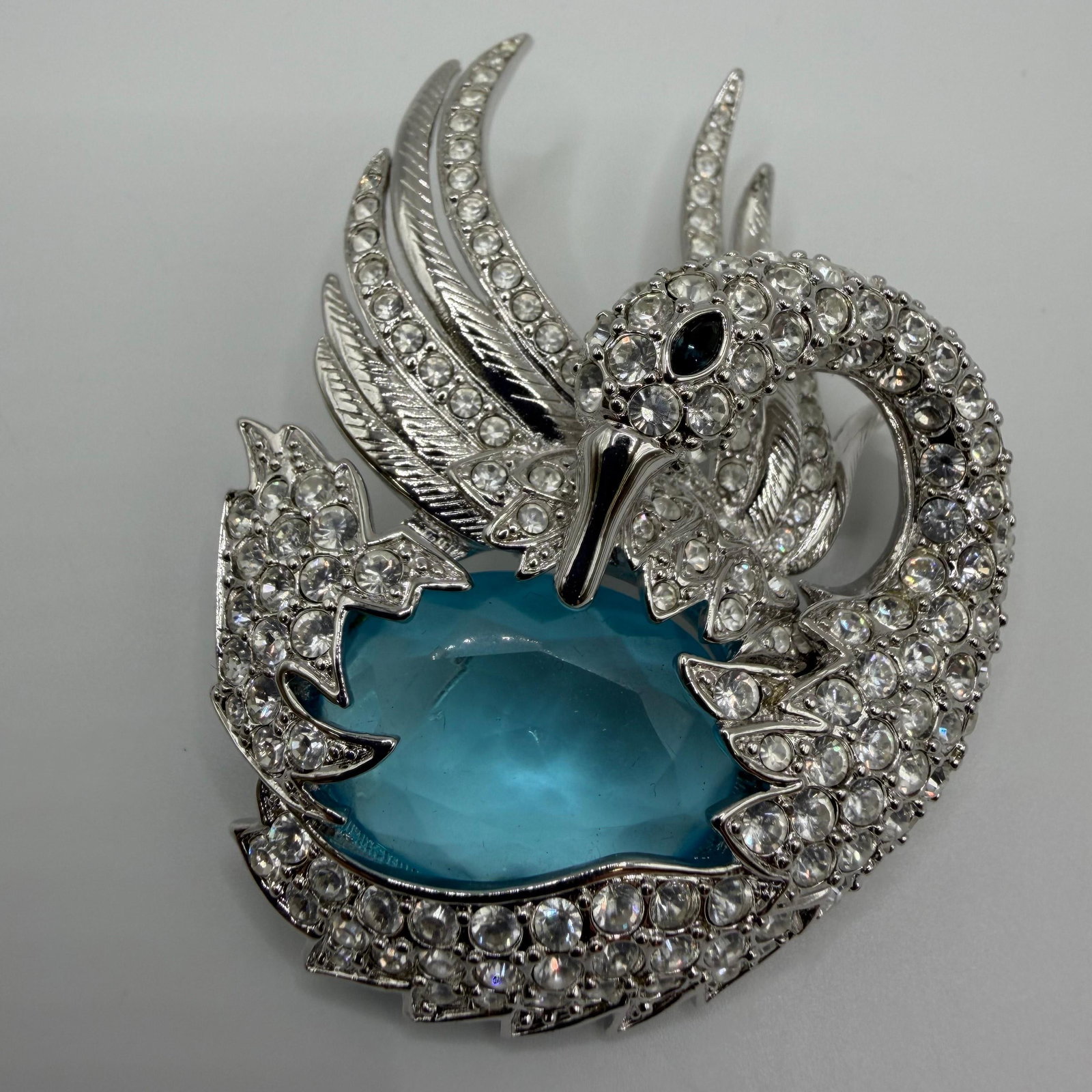 Silver Tone Nolan Miller Crystal Swan Brooch with Blue Cabochon Center Accent (1 of 3)