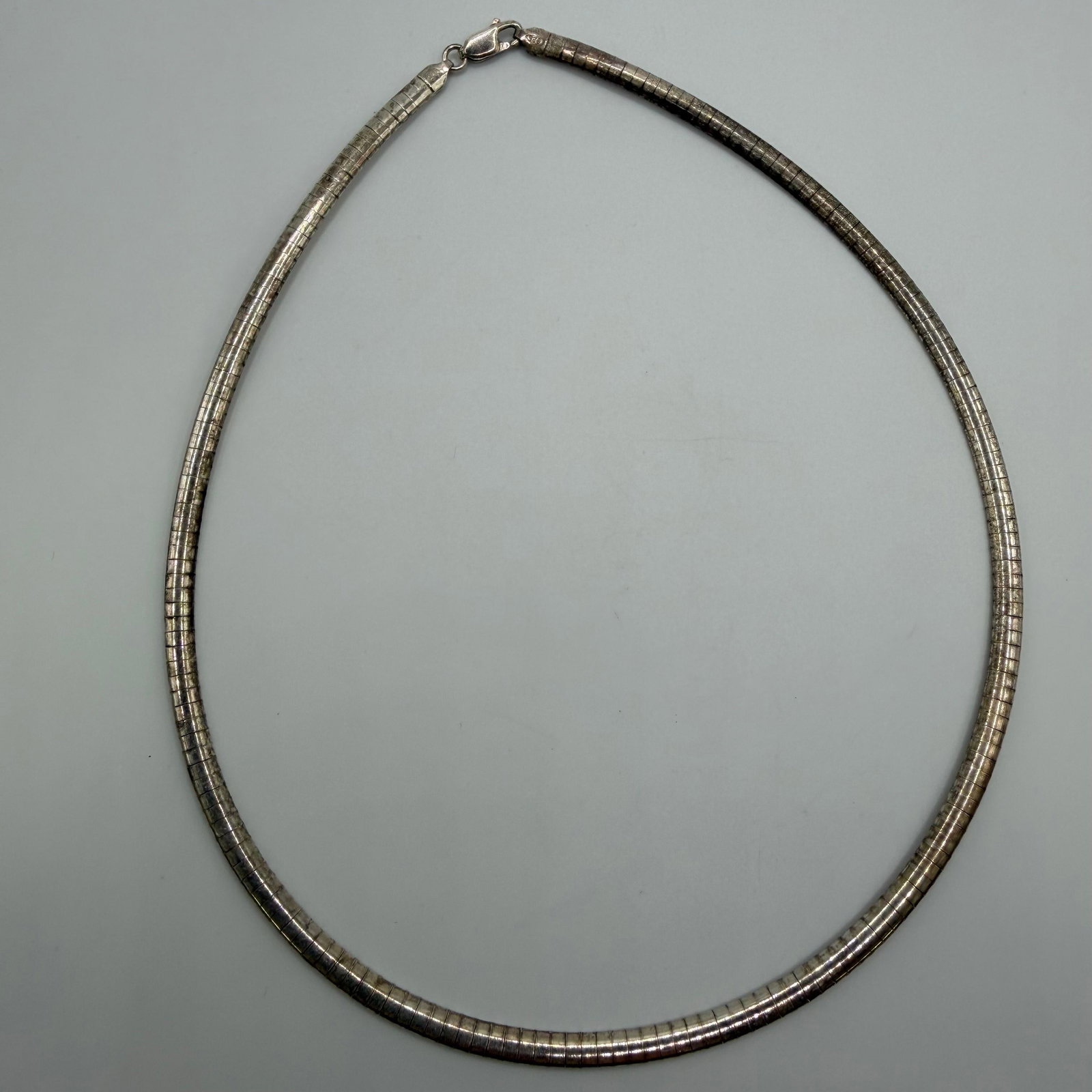 Italian 925 Omega Style Sterling Flay Lay Necklace Italy: This item is in pre-owned, previously used/displayed condition with noticeable light wear and surface scratches. Please reference all photos for full details. This piece of jewelry has been tested and