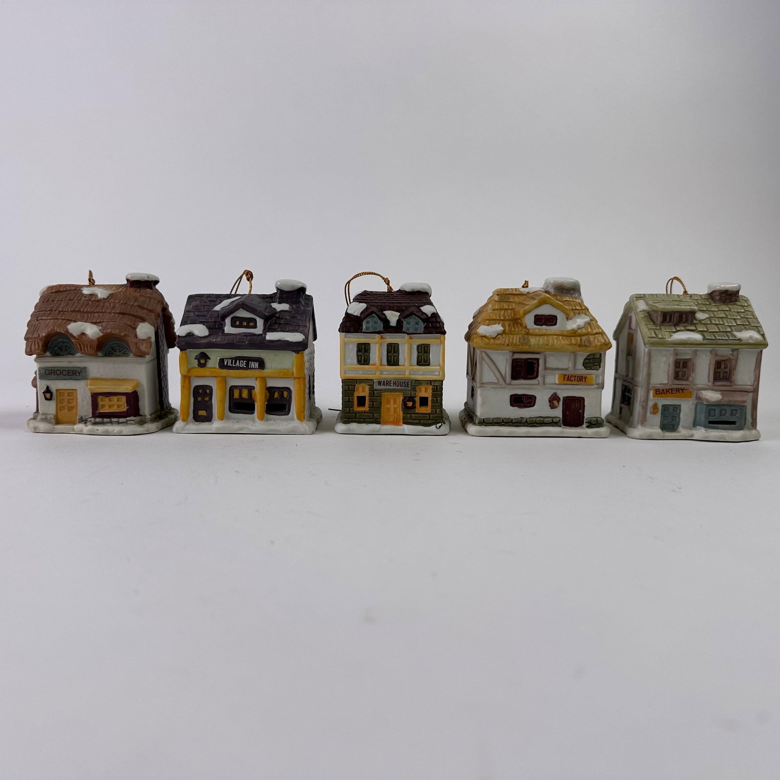 Dickens Village Bell Lites Porcelain Christmas Ornaments Tree or Table Top Set 5: Porcelain holiday ornament handcrafted, hand-painted, a uniquely collectible bell that glows from within. J.S.N.Y. Item No. 15300. These items are in pre-owned, previously displayed condition wit