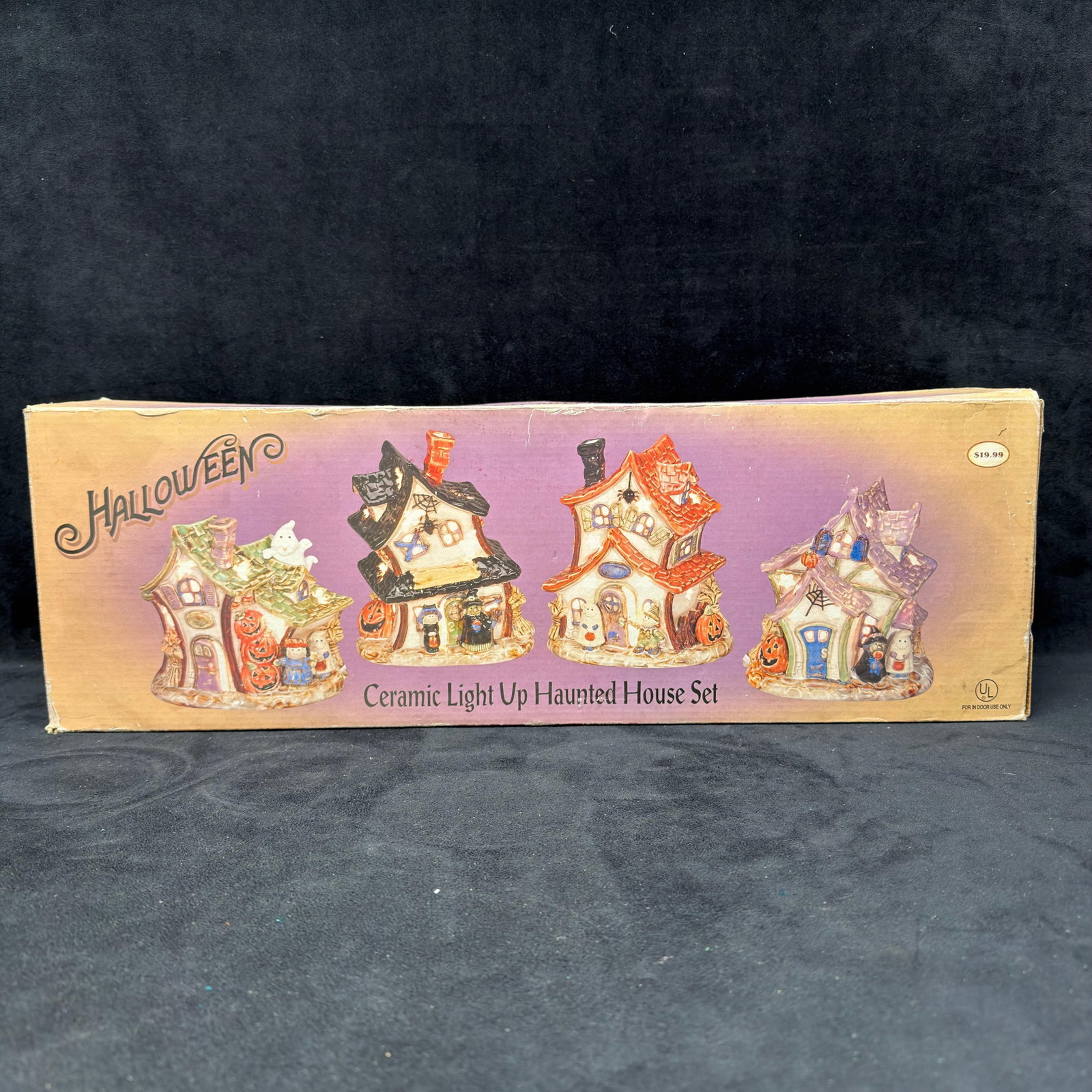 4 Piece Ceramic Light Up Haunted House Halloween Fall Village Set: Four-piece ceramic Halloween light-up haunted house village set with original box and foam insert. Includes four individually lit haunted houses with Halloween figures, including ghosts, pumpkins, wit