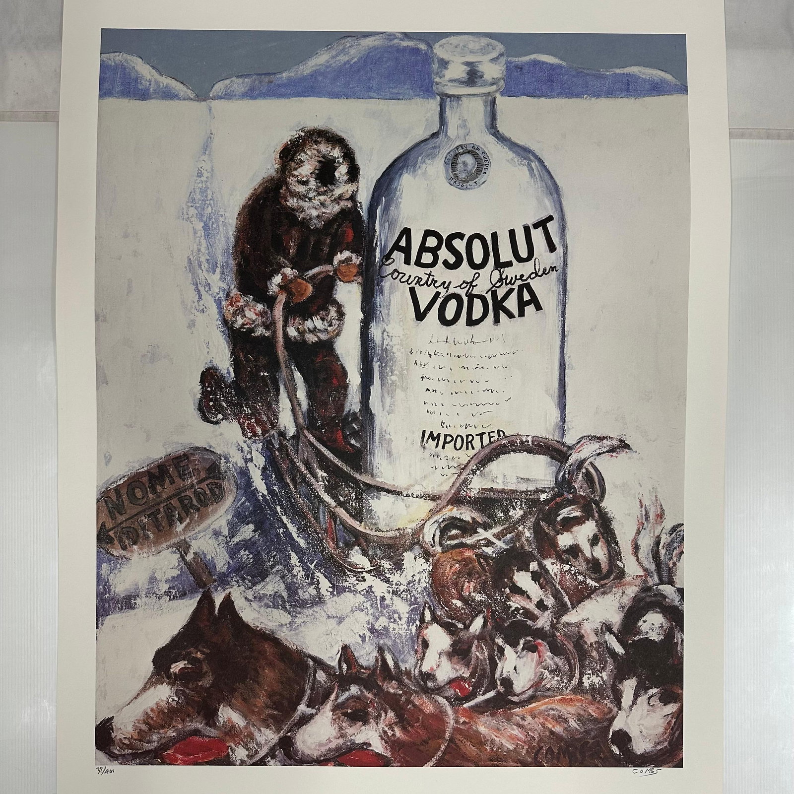 Print Signed and Numbered Absolut Statehood Alaska Alex D. Combs: Limited edition Absolut Vodka “Statehood” lithograph print on paper. Features the iconic Absolut bottle incorporated into a stylized Alaska-themed landscape composition. Hand-signed by