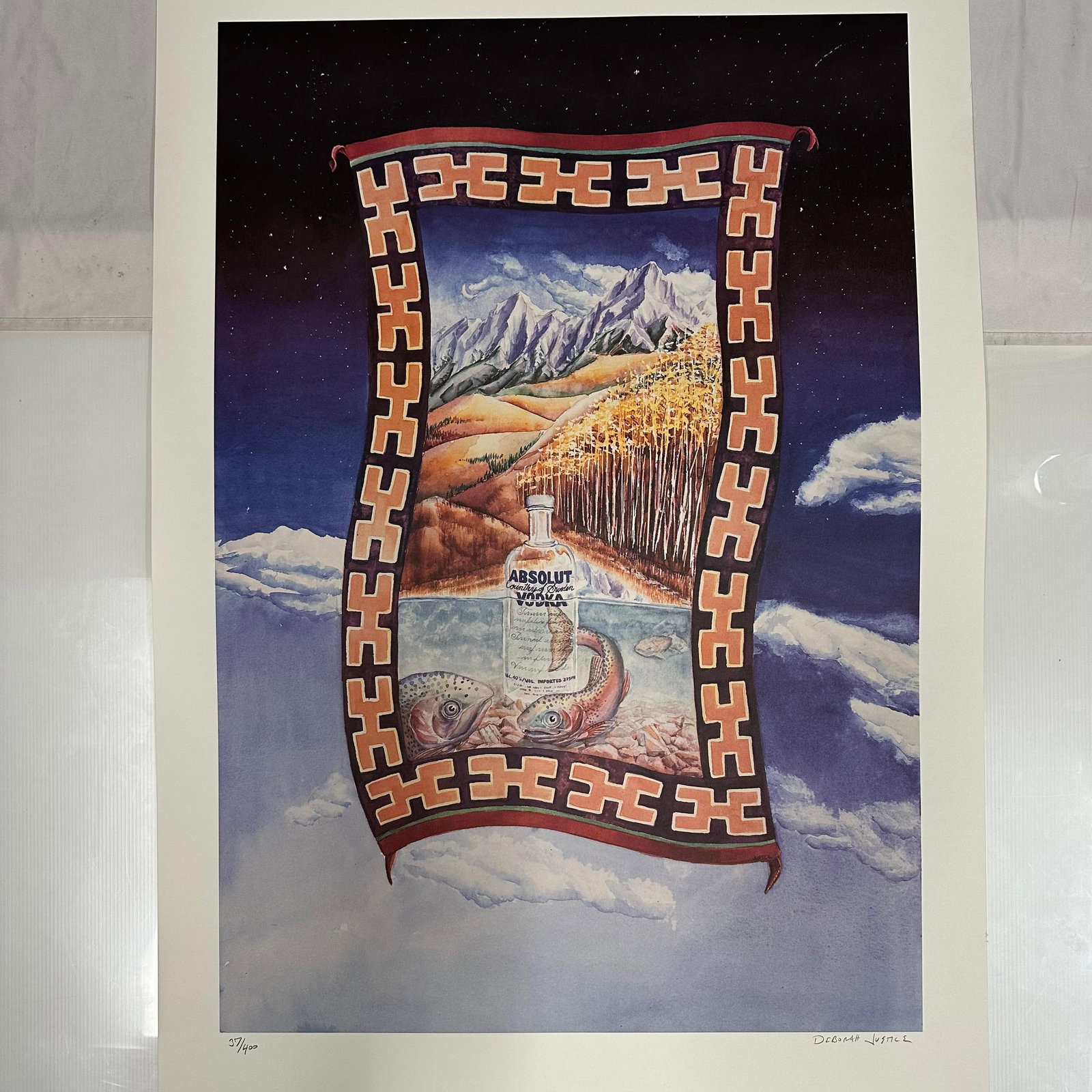 Colorado Deborah Justice Absolut Statehood Print Signed and Numbered: Limited edition Absolut Vodka “Statehood” lithograph print on paper. Features the iconic Absolut bottle incorporated into a stylized Colorado-themed landscape composition. Hand-signed by
