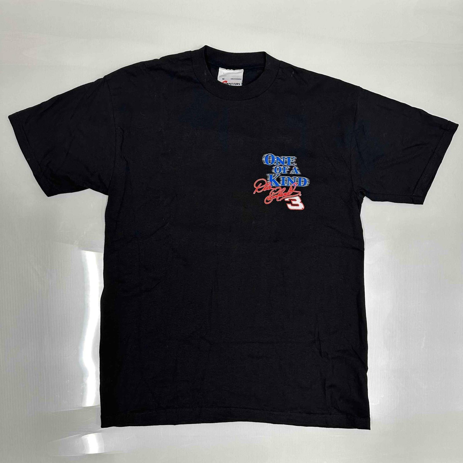 Dale Earnhardt One of a Kind Medium T-Shirt 7 Championships Intimidator Black Racing Shirt: Dale Earnhardt One of a Kind Medium T-Shirt 7 Championships Intimidator Black Racing Shirt. This item is in good pre-owned, previously displayed condition with light wear, surface stains, and dis