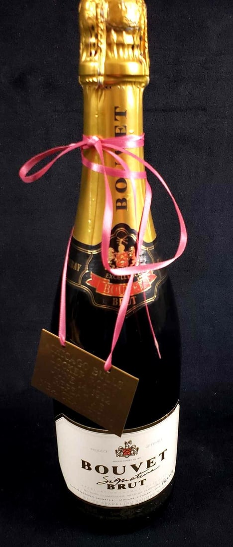 Bouvet Signature Brut Chicago Bulls Locker Room June 14 1992 Repeat as NBA Champions Sealed Bottle: Bouvet Signature Brut Chicago Bulls Locker Room June 14 1992 Repeat as NBA Champions Sealed Bottle. This bottle is in great used condition. The bottle has a ribbon with a small plaque reading "Chi