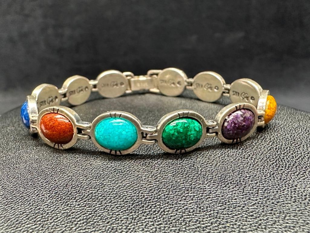 Sterling Composite Stone Bracelet: This piece of jewelry has been tested and researched prior to listing. Please view all our pictures they are part of our description. DETAILS: Metal - Sterling Silver Color - Silver Stones - none