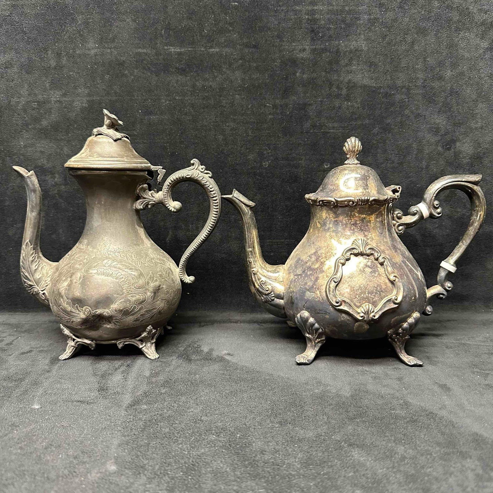 Silver Plated Teapot Coffee Pot Set Antique Tea Pots: Two antique silver-plated vessels, likely used as a coffee or tea pot. Each showcasing intricate designs and classic aesthetic. The left vessel is showing heavy tarnishing/discoloring. It is a tall sl
