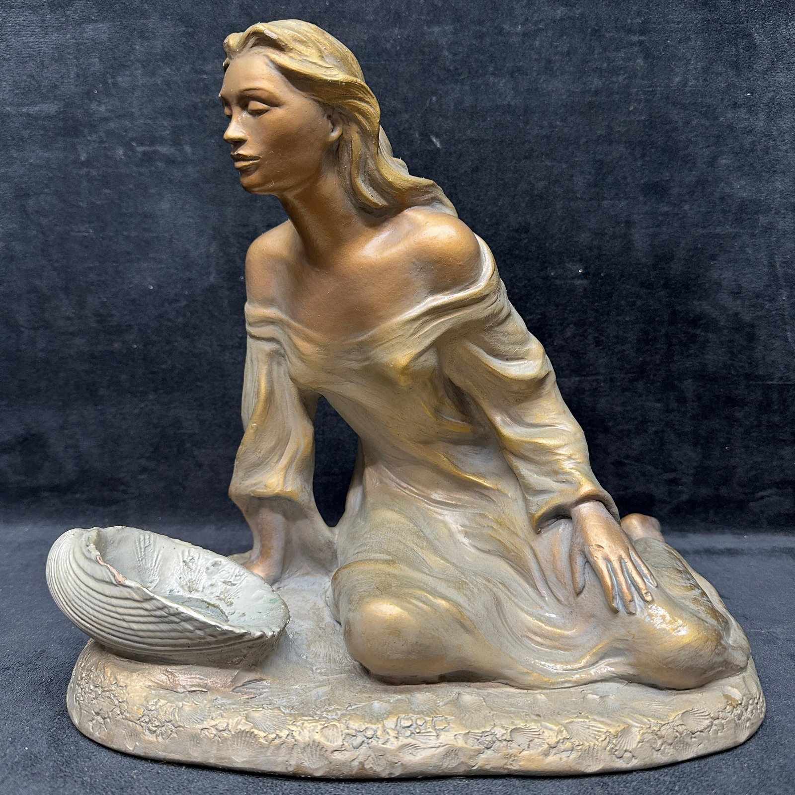 Austin Productions Shimmering Sea Sculpture Female Figure With Shell Dish: Decorative sculpture by Austin Productions titled Shimmering Sea. Features a seated female figure in a flowing, draped garment with a shell form dish at her side. Composite resin construction with met
