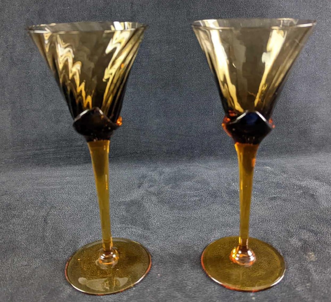 JB 2 Mikasa Amber Crystal Blossom Wine Glasses: This Lot Includes Two Mikasa Amber Crystal Blossom Wine Glasses. These were retired in the 1980s. Each glass is approx 4" x 4" x 9 1/4" and together they weigh 1.33lb. Each glass is in a good,
