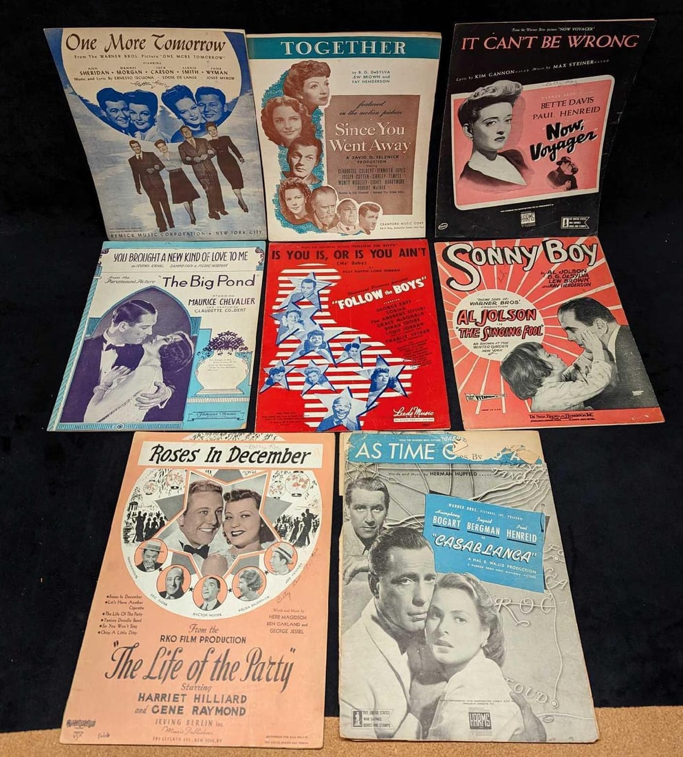 8 Vintage Classic Movie Sheet Music: This lot includes: (1) Roses In December - The Life Of The Party. This was copyrighted in 1937. (1) As Time Goes By - Casablanca. This was copyrighted in 1931. The cover is lose from the sheet music a