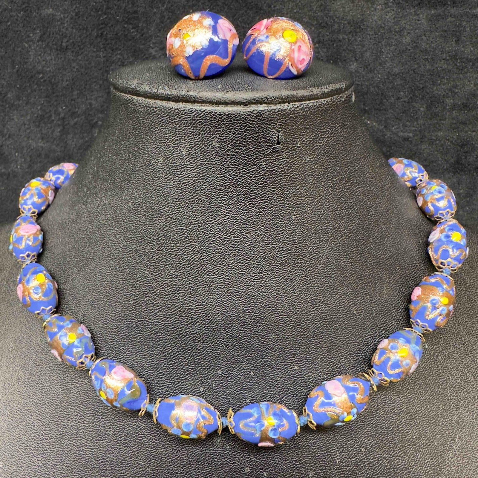 Murano Venetian Art Glass Lamp Work Fiorato Floral Dark Blue Beaded Necklace and Earrings Set C81: Murano Venetian Art Glass Lamp Work Fiorato Floral Dark Blue Beaded Necklace and Earrings Set C81. Necklace and earrings with blue glass beads with beautiful designs on each. The necklace and earrings