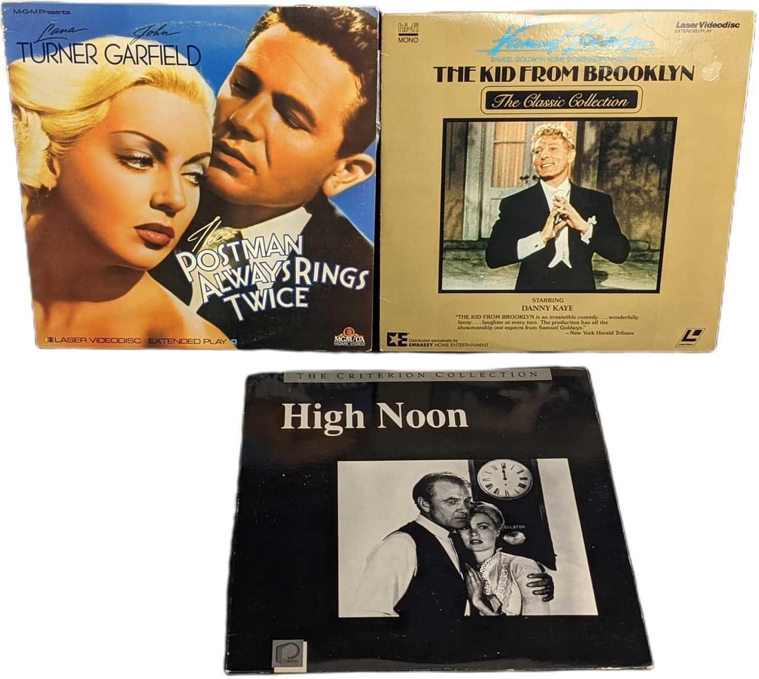 High Noon Postman Always Rings Twice Kid From Brooklyn Laserdiscs: This lot includes: (1) High Noon. This was released by the Criterion Collection in 1989. (1) The Kid From Brooklyn. This was released by Embassy Home Entertainment In 1986. (1) The Postman Always