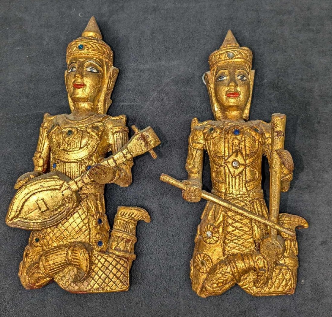 2 Vintage Buddha Musician Gilt Wooden Wall Statues: 2 Vintage Buddha Musician Gilt Wooden Wall Statues. The lute player is approx 6" x 3" x 12 3/4" and the other musician is approx 5 3/4" x 5" x 12" and the total weight is 2.50lbs. One is missing its