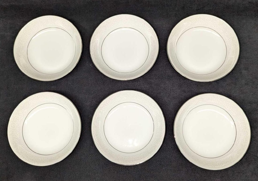 6 Retired International Juliet Sauce Bowls A: 6 Retired International Juliet Sauce Bowls A. Each bowl is approx 5 1/2" x 5 1/2" x 1 1/4" and the total weight is 2.05lb. The bowls are made of fine china and do not have any chips or cracks.