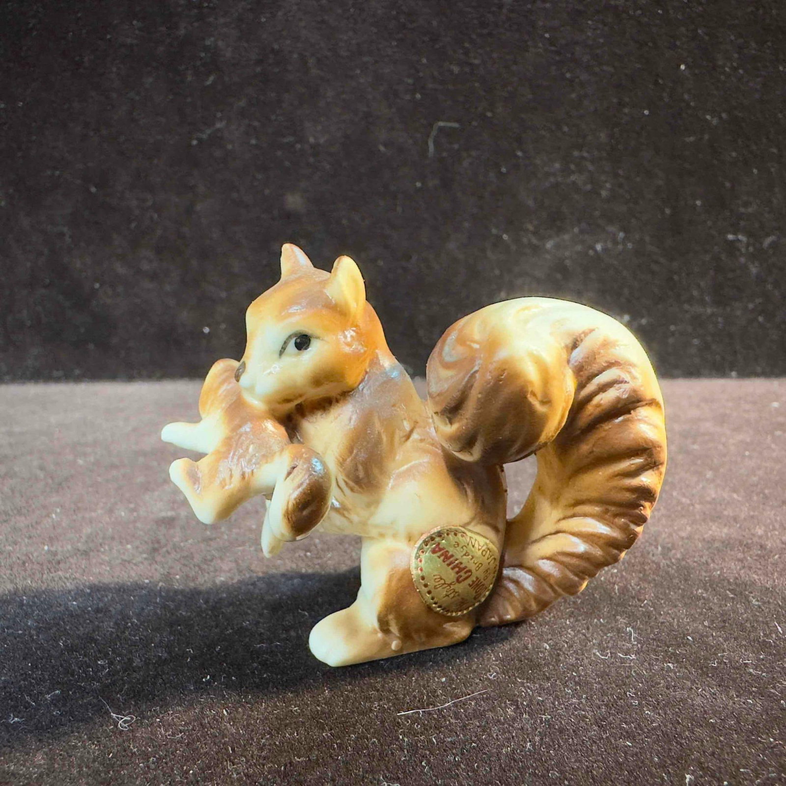 Miniature Squirrel Mini Figurine Figure Hi Style Bone China By Bridge Japan: Miniature Squirrel Mini Figurine Figure Hi Style Bone China By Bridge Japan. This cute friendly little mini Squirrel holding it's baby is made of porcelain.This item is in great pre-owned, previou