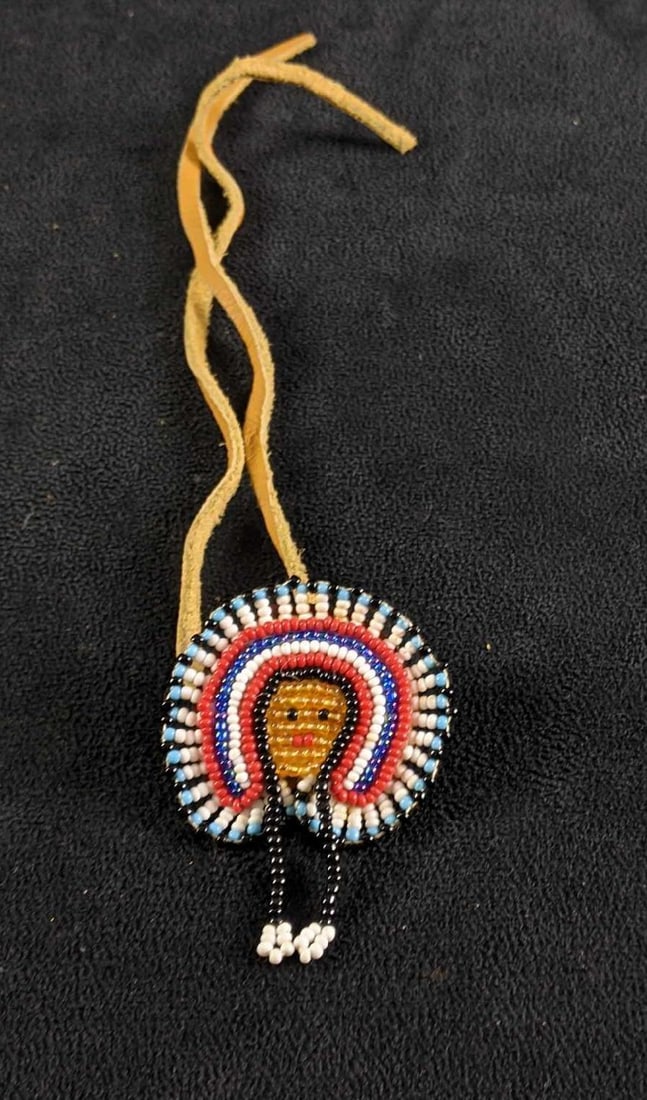 Beaded Necklace Native American Style Necklace: Beaded Necklace Native American Style Necklace This necklace is in great condition. This seems to be hand beaded and on authentic leather. The necklace you just tie around your neck to wear. There is 