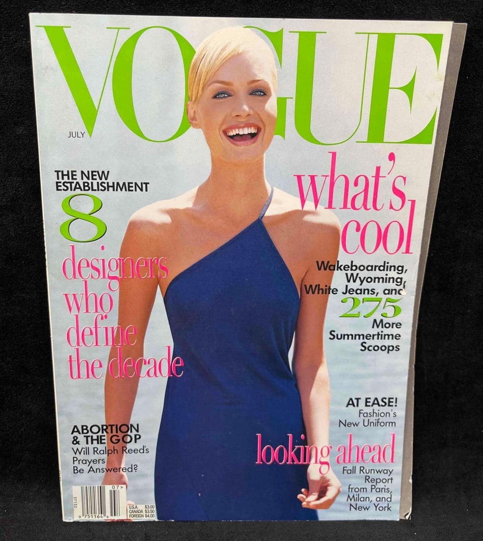 Vintage Vogue July 1996 (1): This lot contains a Vintage Vogue July 1996 (1). It is approx 11" x 8 1/4" and it weighs about 0.9lbs. Overall the vintage magazine is in good used condition with some minor shelf wear. There are some