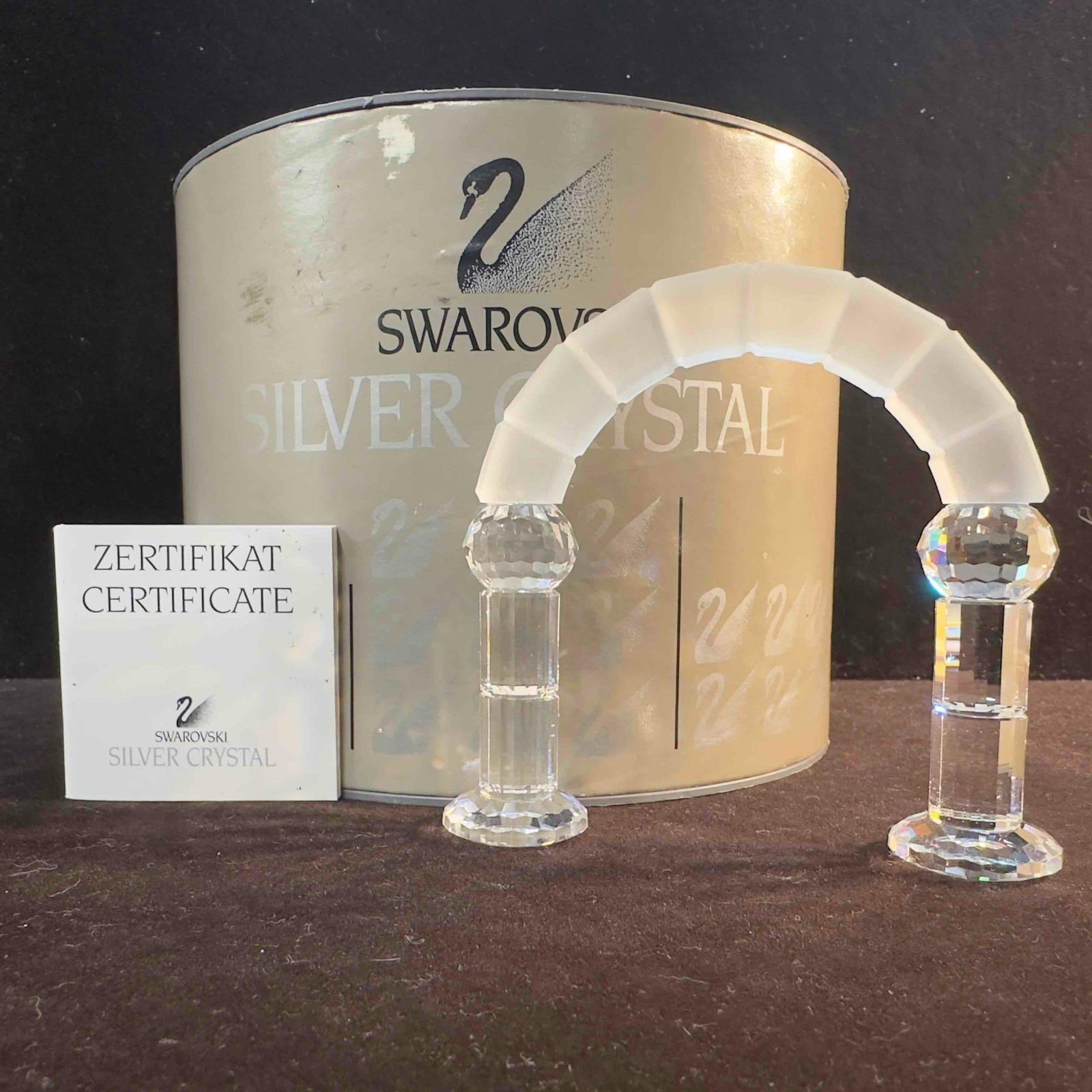 Swarovski Silver Crystal Figurine Nativity Scene Arch 7475 NR 000 010: Swarovski Clear Crystal Glass Nativity Scene Arch Figurine. This figure is a beautiful crystal glass art piece featuring a Nativity Scene Arch from Swarovski Crystal. The item features a beautifully e